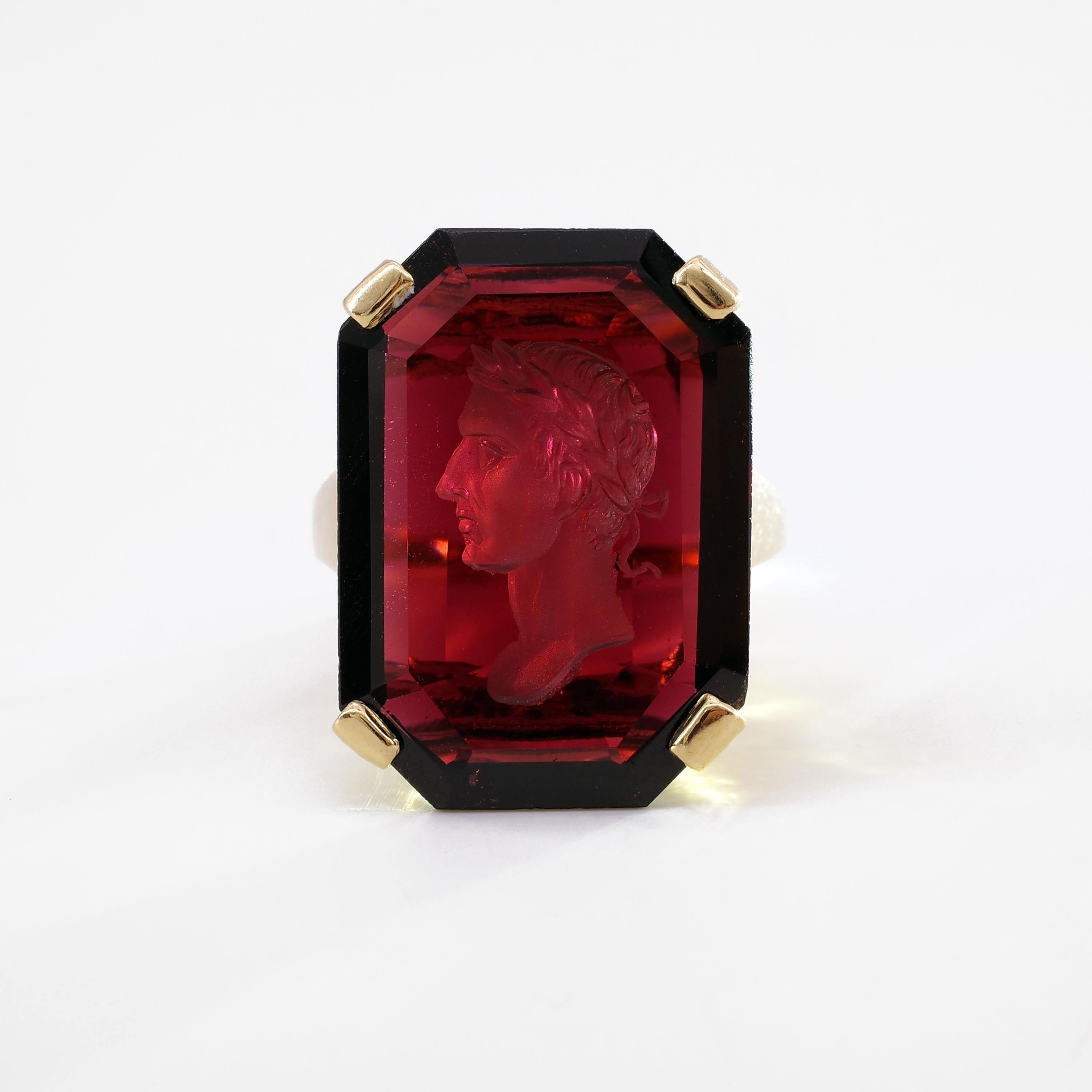 What a ring.

Let me start again: What. A. Ring.

This carved garnet intaglio is magnificently rendered; the details are stunning, evidenced in the images. I believe the intaglio itself is older than the setting. My best educated guess would be