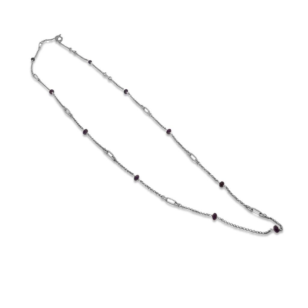 Indulge in the rich allure of this Garnet Link Chain Necklace, a stunning addition to any jewelry collection. Crafted with precision in sterling silver, each link of the chain showcases the deep red hue of garnet stones, renowned for their vibrant