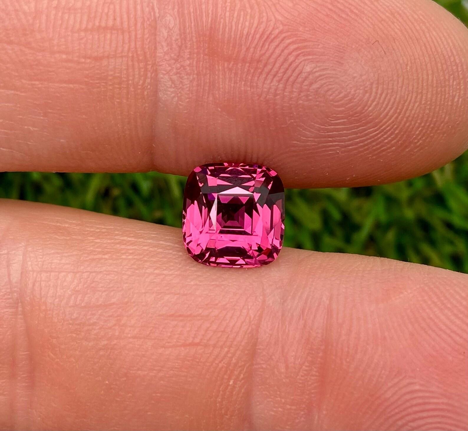 Natural Malaya Garnet Loose gemstone

Laboratory certified GFCO
Gemstone Color: Purplish-Pink
Gemstone Type: Malaya Garnet
Gemstone size: 8.88x8.70x6.17 mm
Cut Grade: Excellent
Clarity/Grade: VS
Gemstone Shape: Cushion cut
Gemstone Creation: