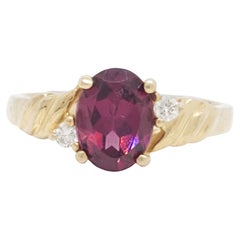 Garnet Oval and White Diamond Cocktail Ring in 14k Yellow Gold
