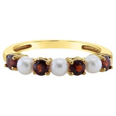 Anello con granato e perle in oro giallo 14k