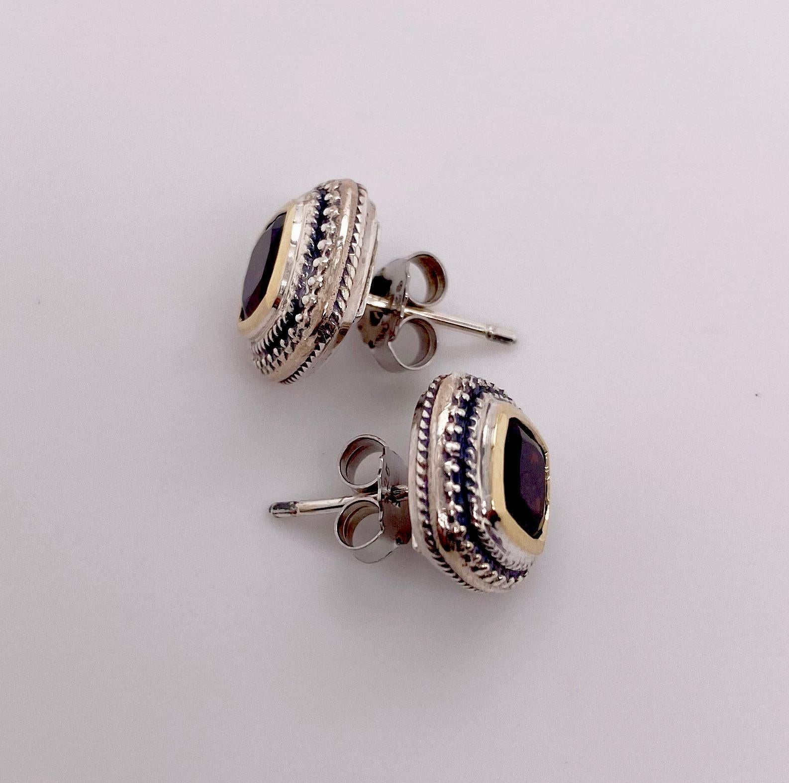The details for these gorgeous earrings are listed below:
Metal Quality: Sterling Silver and 14 Karat Yellow Gold 
Earring Type: Stud 
Gemstone: Garnet 
Gemstone Weight: 1.7 ct 
Gemstone Color: Red 
Measurements: 11.1 mm X 11.1 mm 
Post Type: Stud