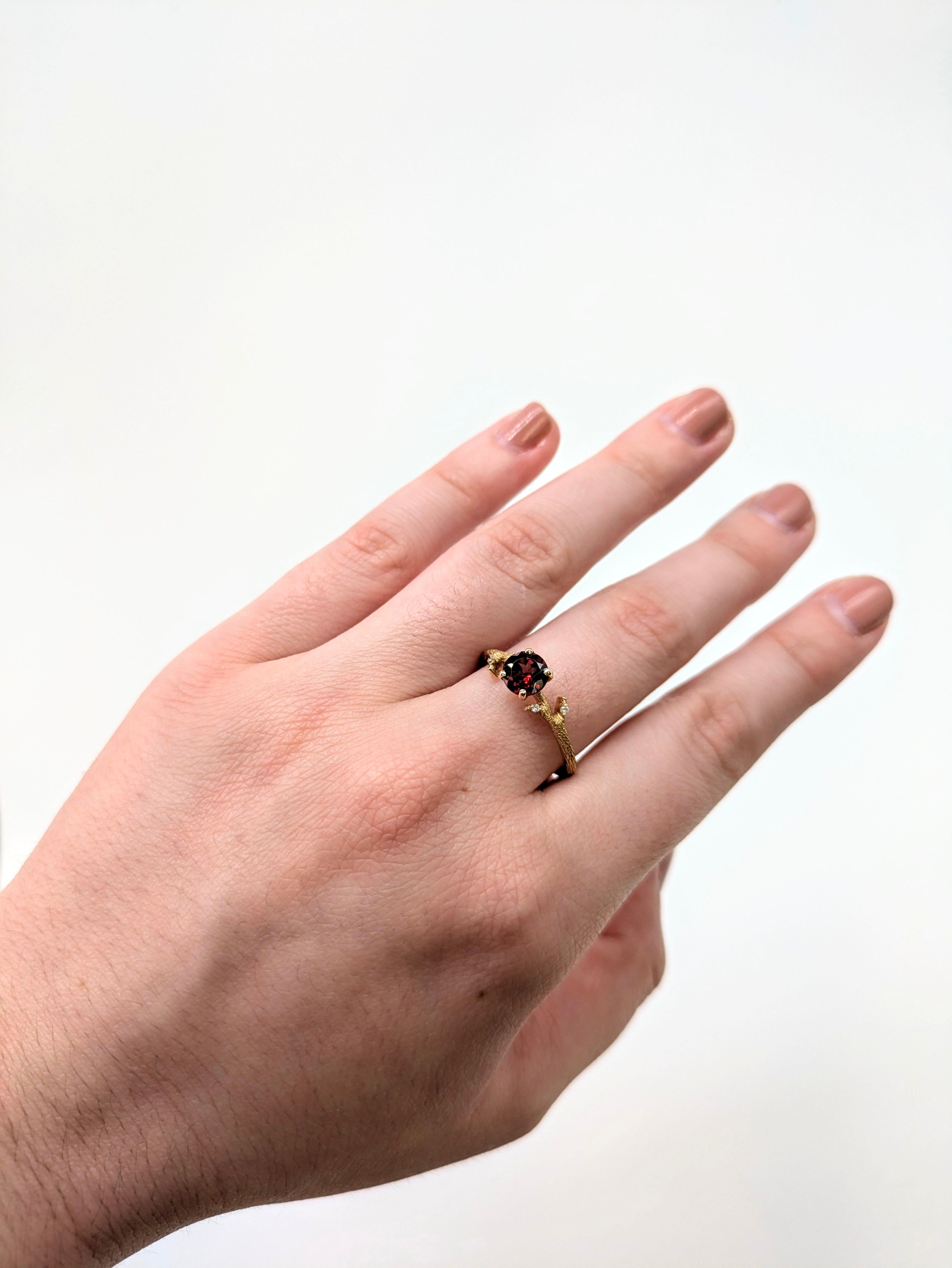This beautiful ring features a 0.80 carat round Garnet gemstone with natural earth mined diamonds set in solid 14K gold. This Garnet ring would be a lovely January birthstone gift for your loved ones! 

Specifications

Item Type: Ring
Center
