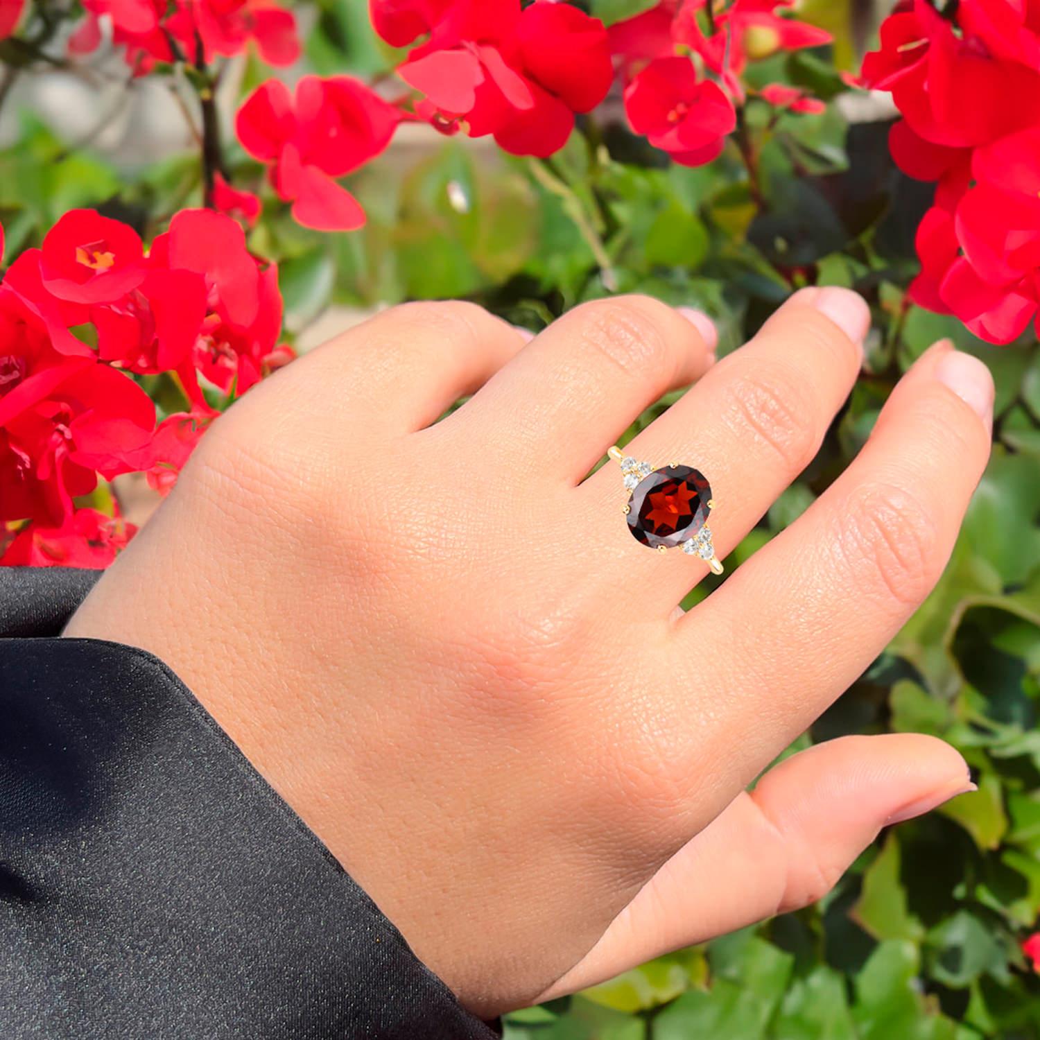 It comes with the Gemological Appraisal by GIA GG/AJP
All gemstones are natural
Garnet = 3.88 Carats
6 White Topazes = 0.24 Carats
Metal: 14K Yellow Gold Plated Sterling Silver
Ring Size: 7* US
*It can be resized complimentary