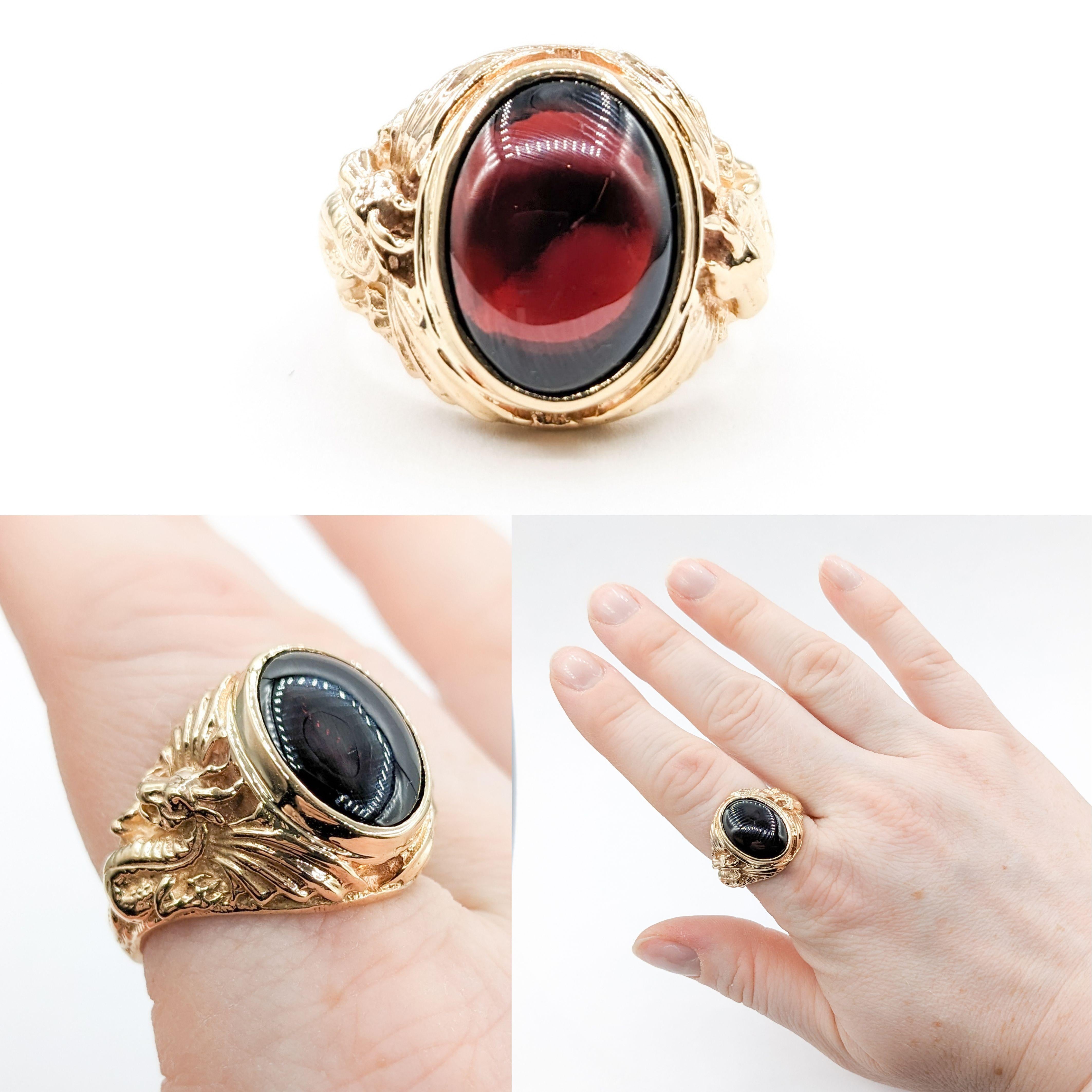 Garnet Ring With a Dragon Motif & Large Cabochon Garnet - 14k

Unveil the splendor of this exceptional Garnet Ring, with sculpted Dragons motif. Meticulously crafted in 14ky yellow gold, the ring shows stunning detail. The centerpiece of this