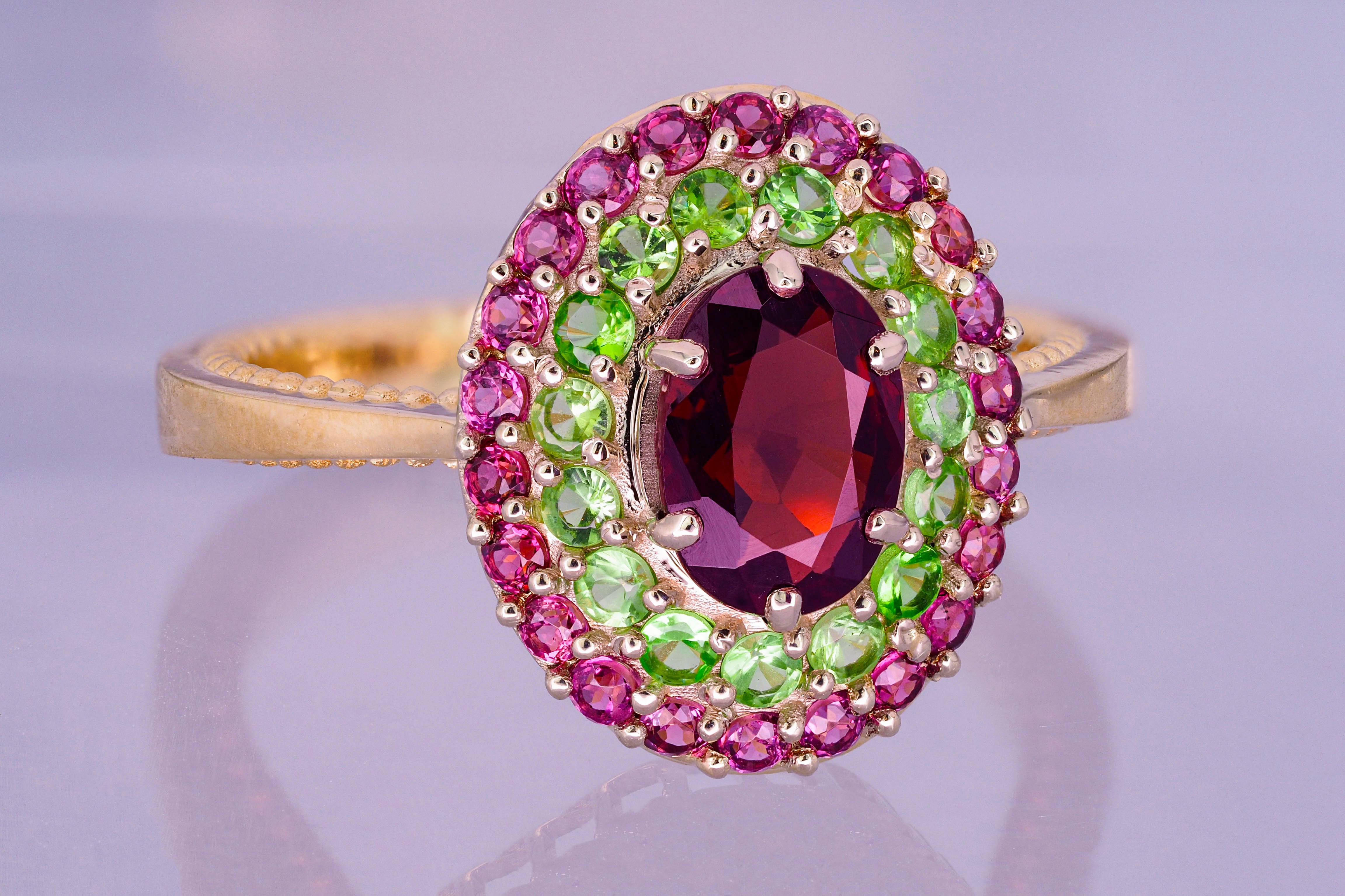 Women's Garnet ring with side tsavorites and rubies. For Sale