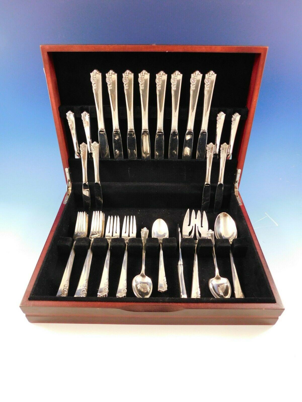 Scarce Garnet rose by Lunt sterling silver flatware set - 44 pieces. This set includes:

8 knives, 9