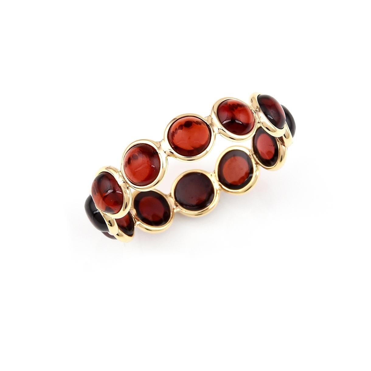 Shape: Round Cabochon

Stone: Garnet

Metal: 14 Karat Yellow Gold (can be customized)

Style: Single Line Band

Ring Size: US 7.75 (can be customized)

Stone Weight: appx. 5 carats of Garnet

Total Weight: 1.60 grams