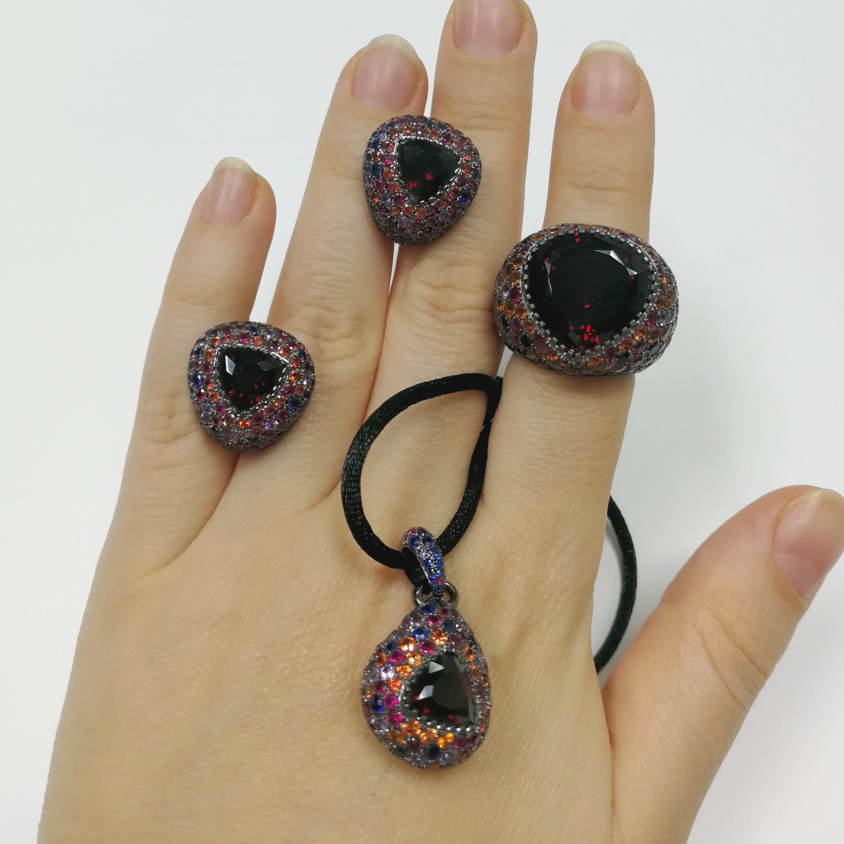 Garnet Sapphires Rubies Black 18 Karat Gold Riviera Suite
The name and the variety of colours in this collection are associated with the bright Italian and French Riviera, vivid and colourful houses and sun reflections on the water. A place where