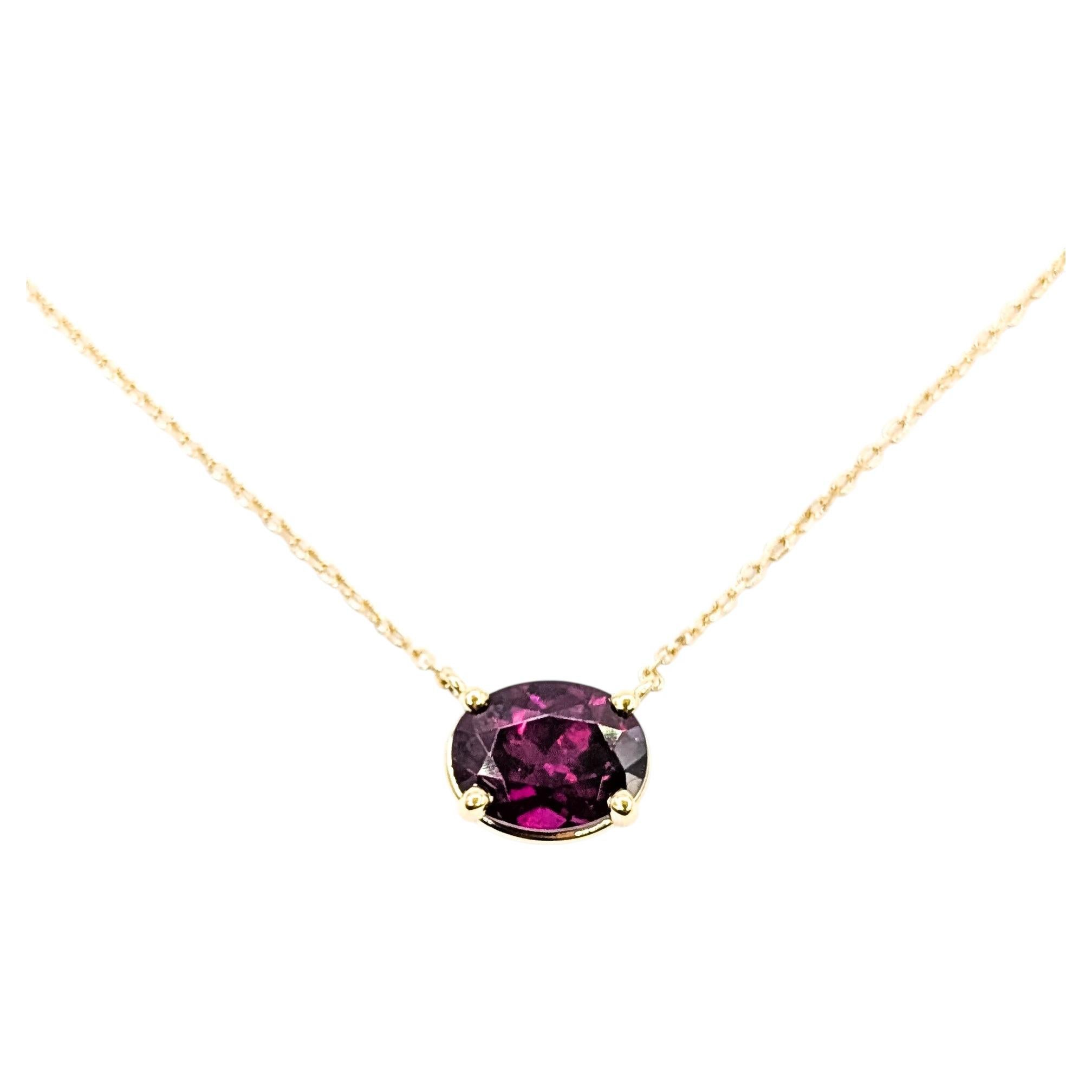 Collier solitaire avec grenat, en or jaune 14 carats