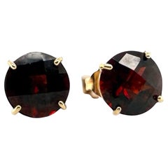 Orecchini con granato in oro giallo 14K