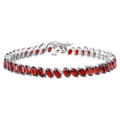 Bracciale tennis con granato 21.4 carati in argento placcato in rodio