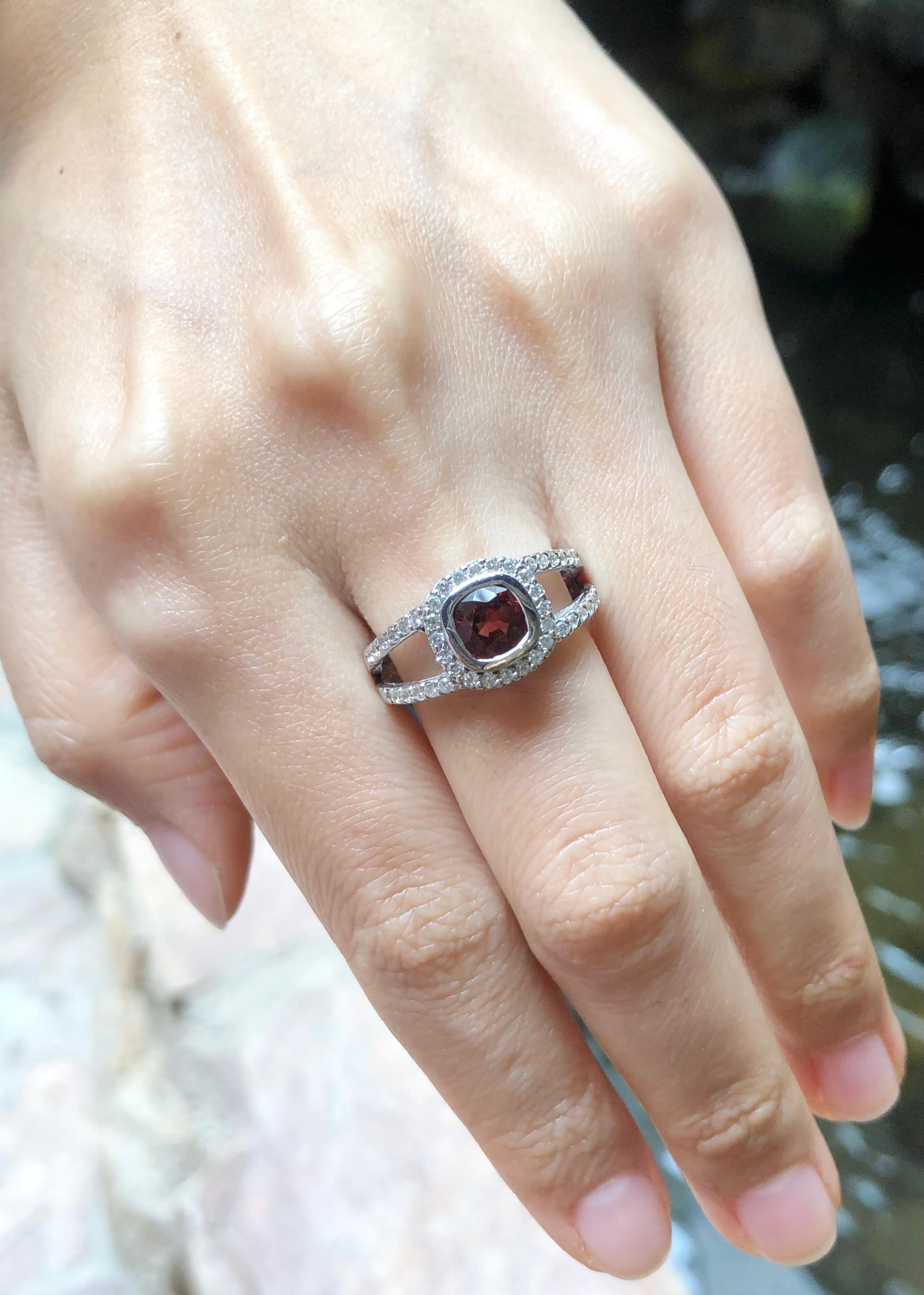 Contemporary Garnet with Cubic Zirconia Ring set in Silver Settings For Sale
