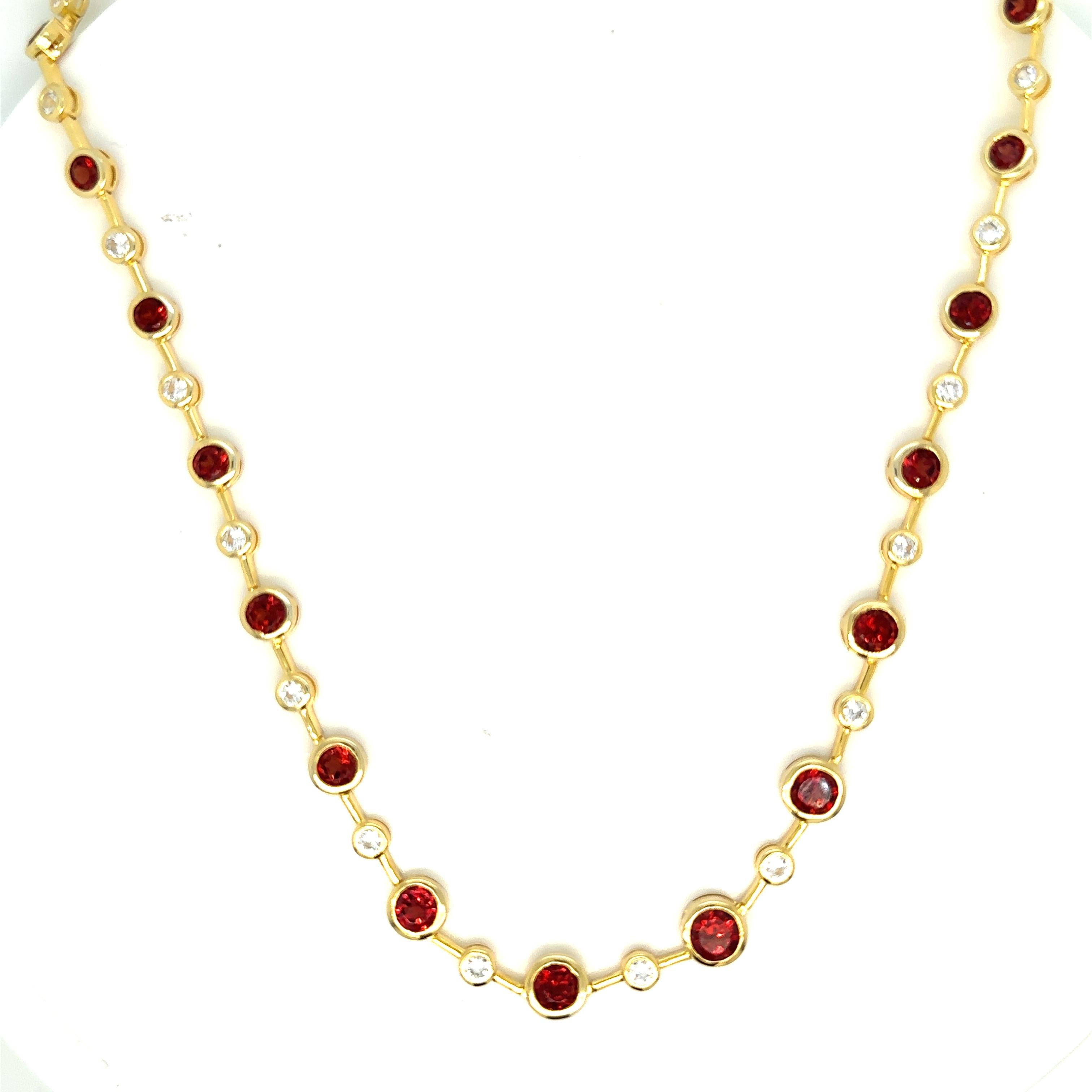 Elevate your style and adorn yourself with the timeless allure of our stunning Garnet White Sapphire necklace. 
With lustrous Garnet gemstones that reflect your unique personality, find the perfect piece that complements your individual beauty.