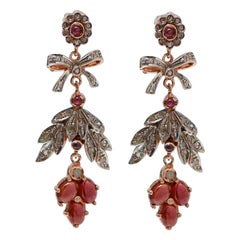 Garnets, Diamonds, Rose Gold and Silver Earrings.
