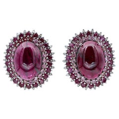 Clous d
oreilles en or blanc 14 carats, grenats, tourmaline, diamants