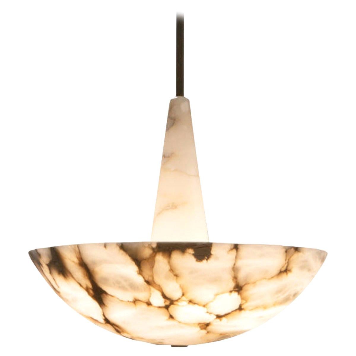 Pendant light by Garnier & Linker: Shade made out of veined Alabaster or Alabaster combined with dark natural brass patina. A 