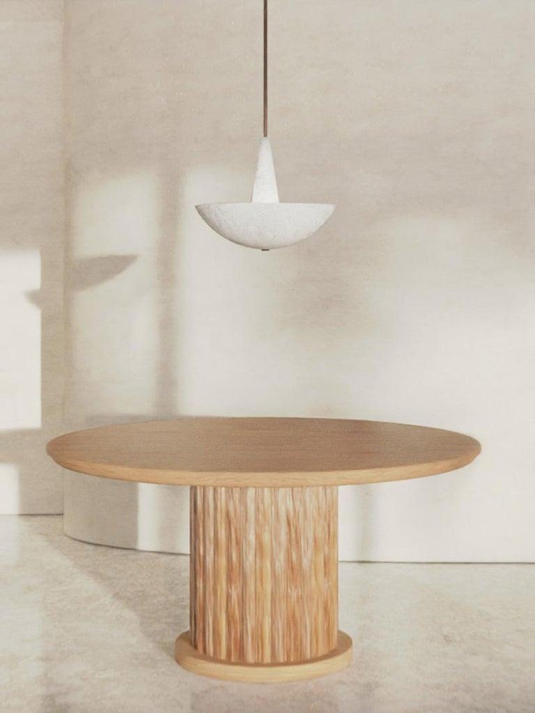 Plaster pendant light

This luminaire was conceptualized by Garnier & Linker in 2022. This pendant light is composed out of a lamp shade in plaster hung by dark natural brass patina stem.
Options: different stem finished are available: natural