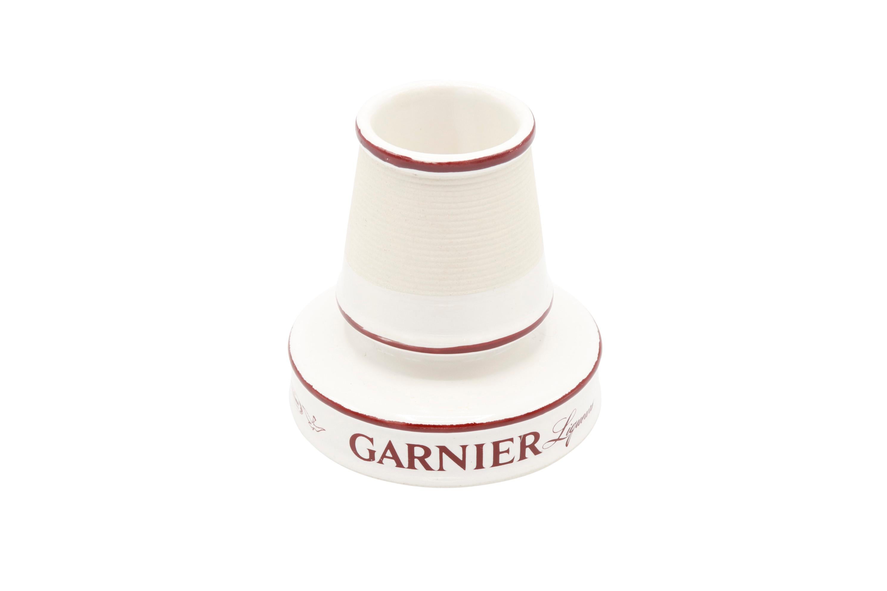 A vintage Garnier Liqueurs ceramic match striker and holder. Traditionally used in cafes, bars etc. In excellent condition.
 