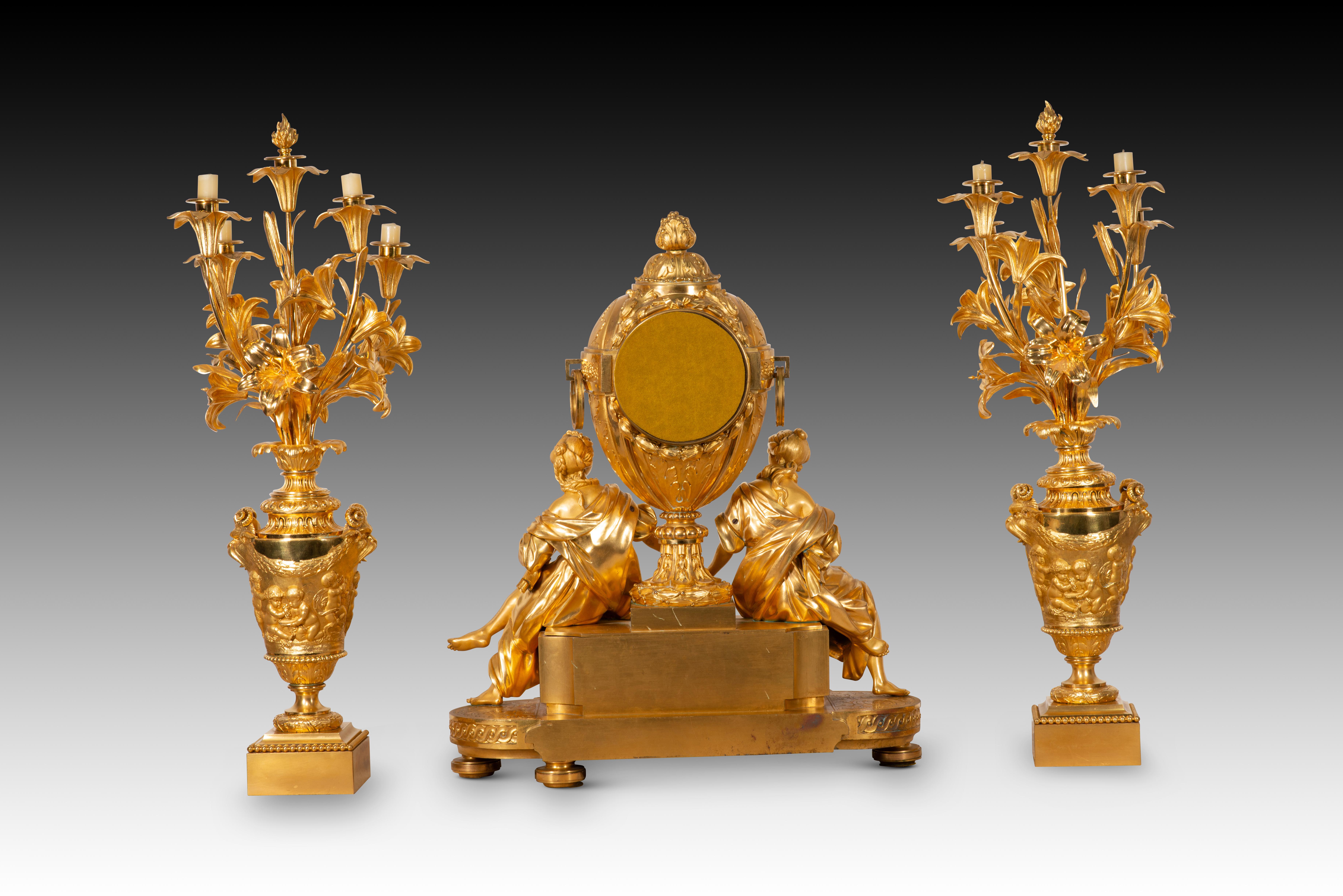French Garnish, clock and two candlesticks. Gilt bronze. H Picard and V Paillard. 19thc For Sale