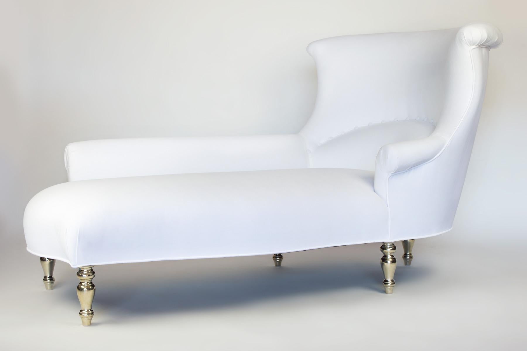 This version of our classic Garonne chaise lounge has 5 white bronze legs and white velvet upholstery. From every angle, you see its distinctive elegant curved lines. The bronze legs create a bold statement.This piece is perfect for cuddling up with