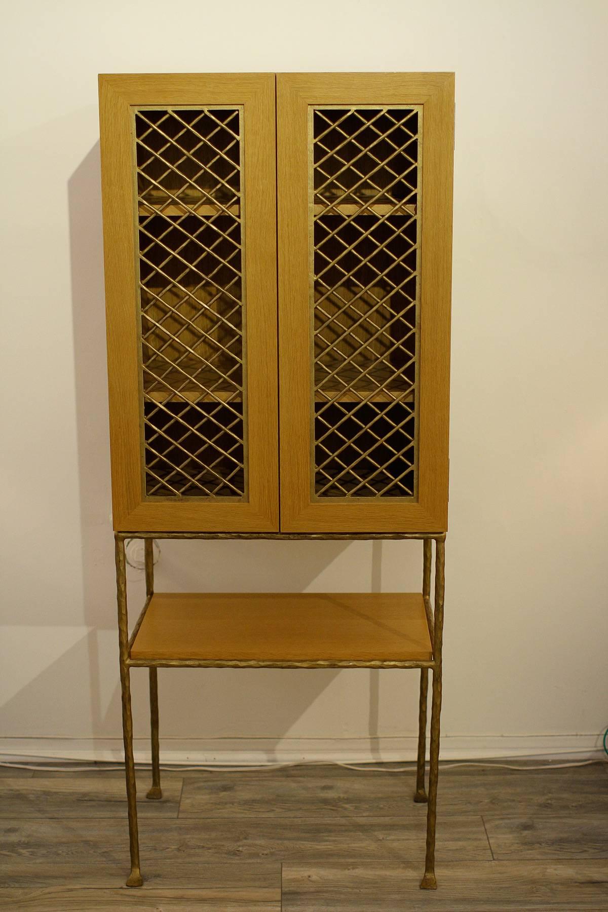 Elizabeth Garouste (Born in 1949) & Mattia Bonetti (Born in 1953)
Elegant oak cabinet with two doors framing a gilt wrought iron grid on a gilt wrought iron base
Collection 