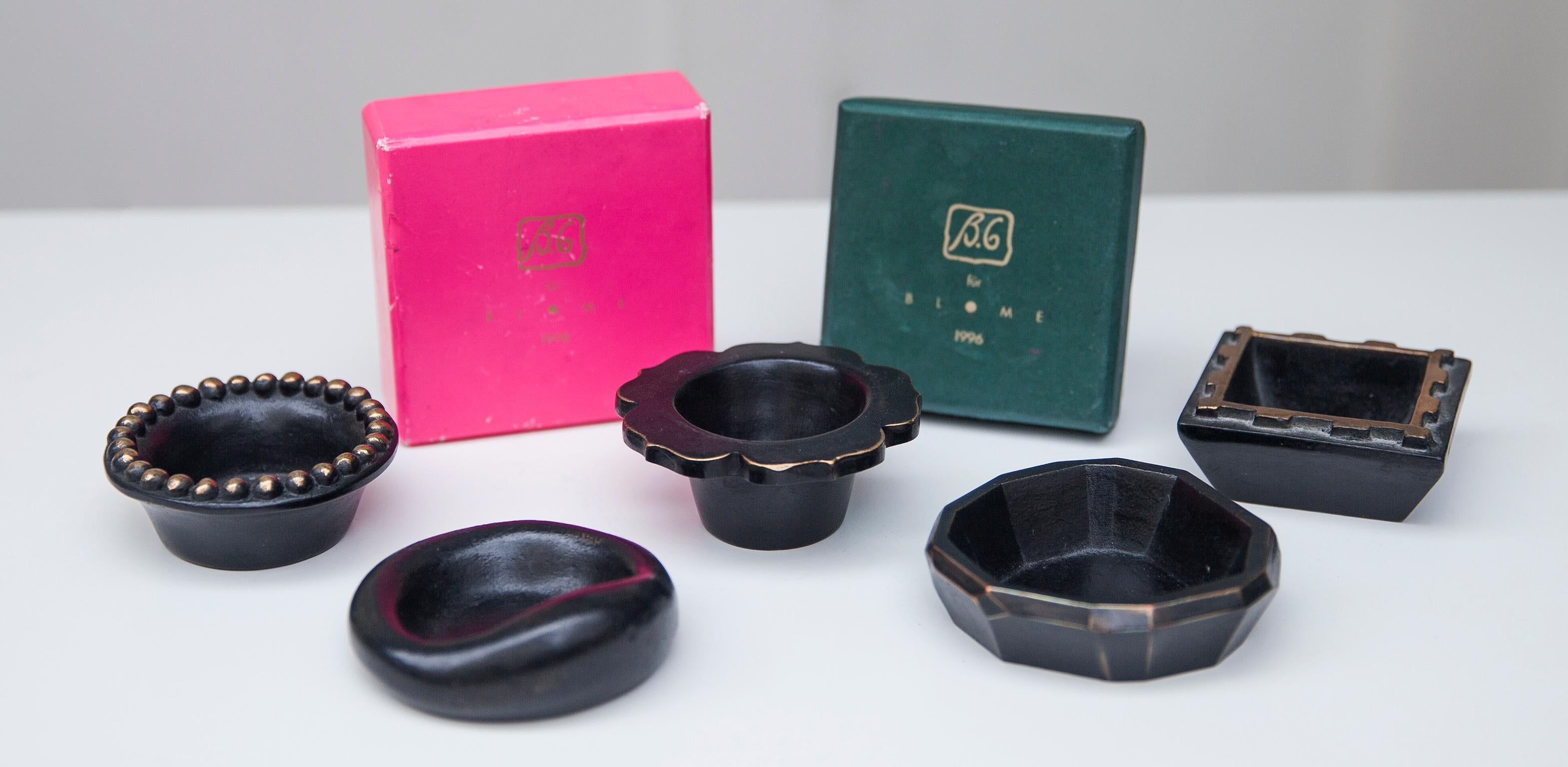 The French designers Elisabeth Garouste et Mattia Bonetti designed these bowls along with seven other small cast bronze objects for Herbert Blome between 1996-2001 signed B.G. BLOME B.G.H. EDITIONS/BLOME. Two original boxes are included.