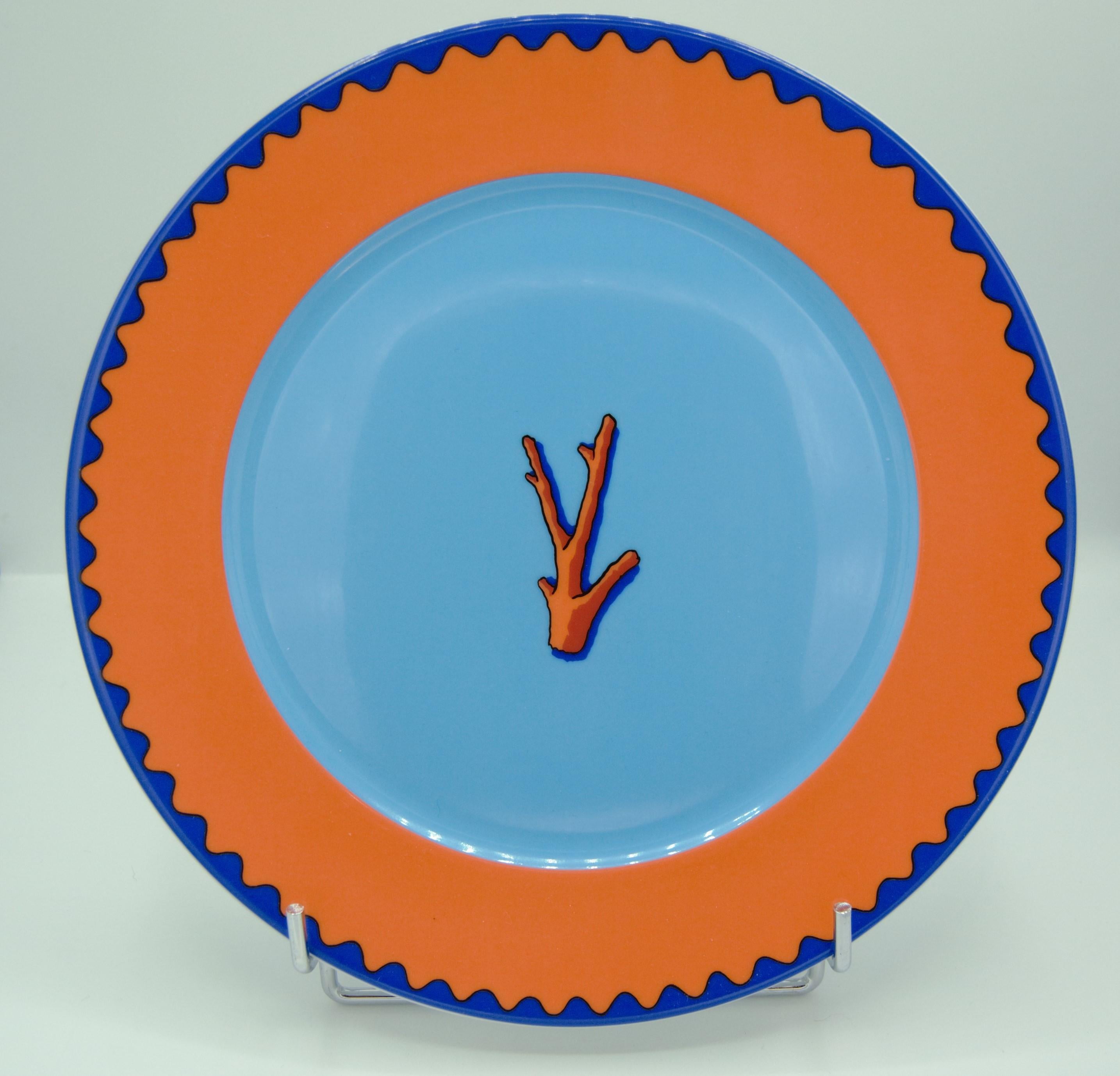 Garouste and Bonetti, by Daum - Limoges
Porcelain plates with dark and light blue with stunning orange border (vice versa according to the plate). Coral motive.



 