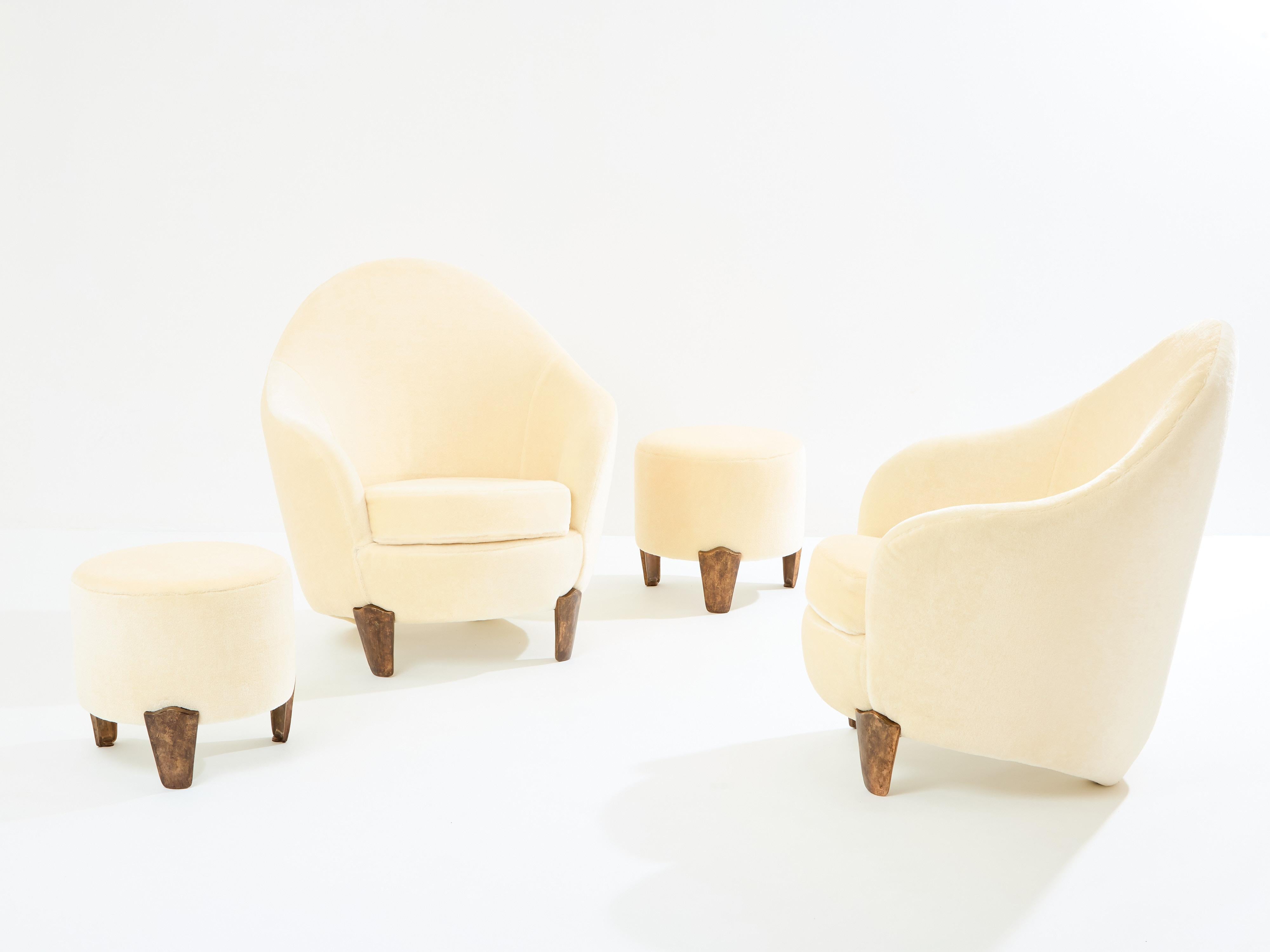 This is a beautiful pair of armchairs with their ottomans by Elizabeth Garouste & Mattia Bonetti, model Koala, with solid bronze feet, fully restored and reupholstered. Garouste & Bonetti began their collaboration and gained global recognition for
