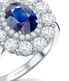 Garrard 1735 GIA Oval Blue Sapphire Diamond Platinum Cluster Engagement Ring