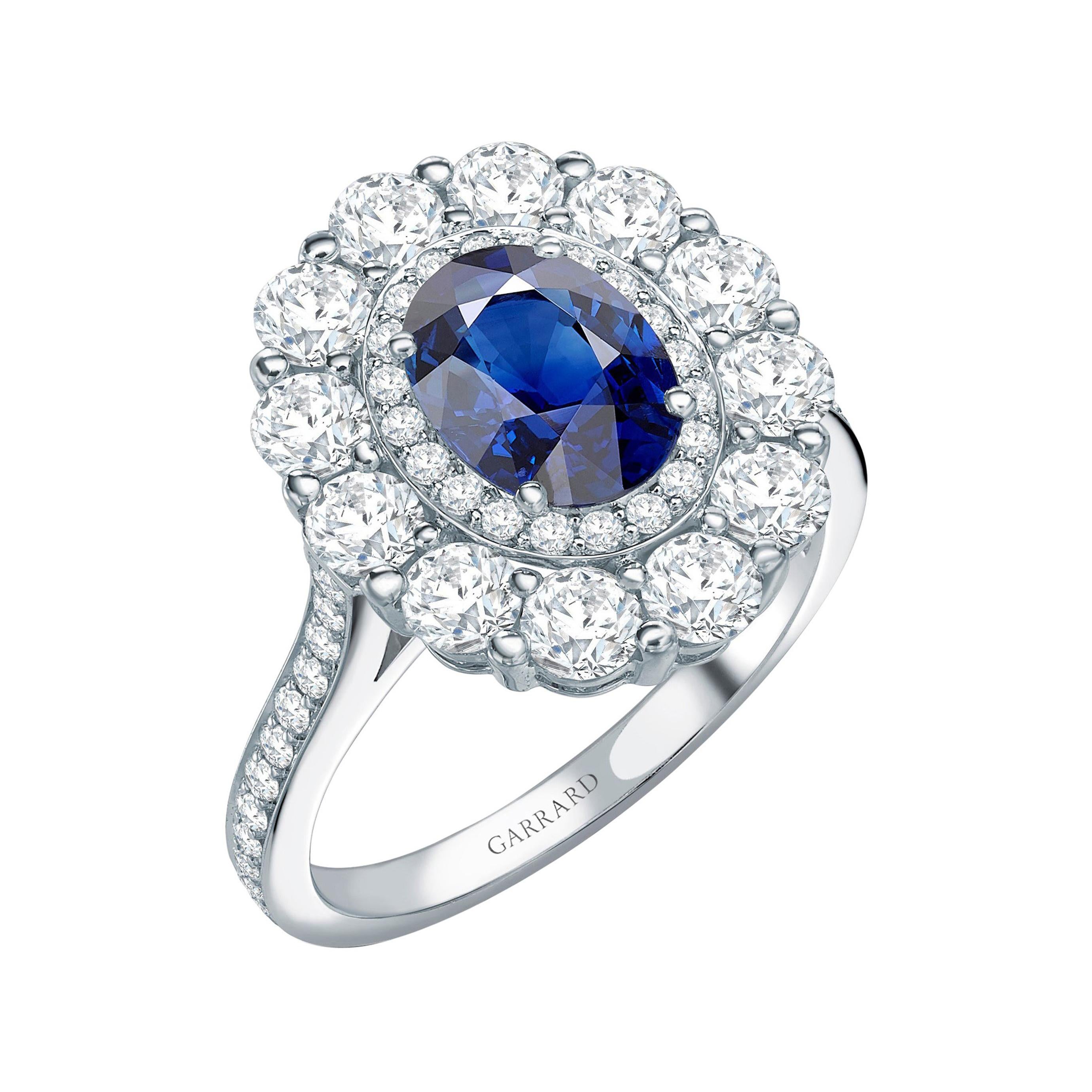 Garrard 1735 GIA Oval Blue Sapphire Diamond Platinum Cluster Engagement Ring For Sale