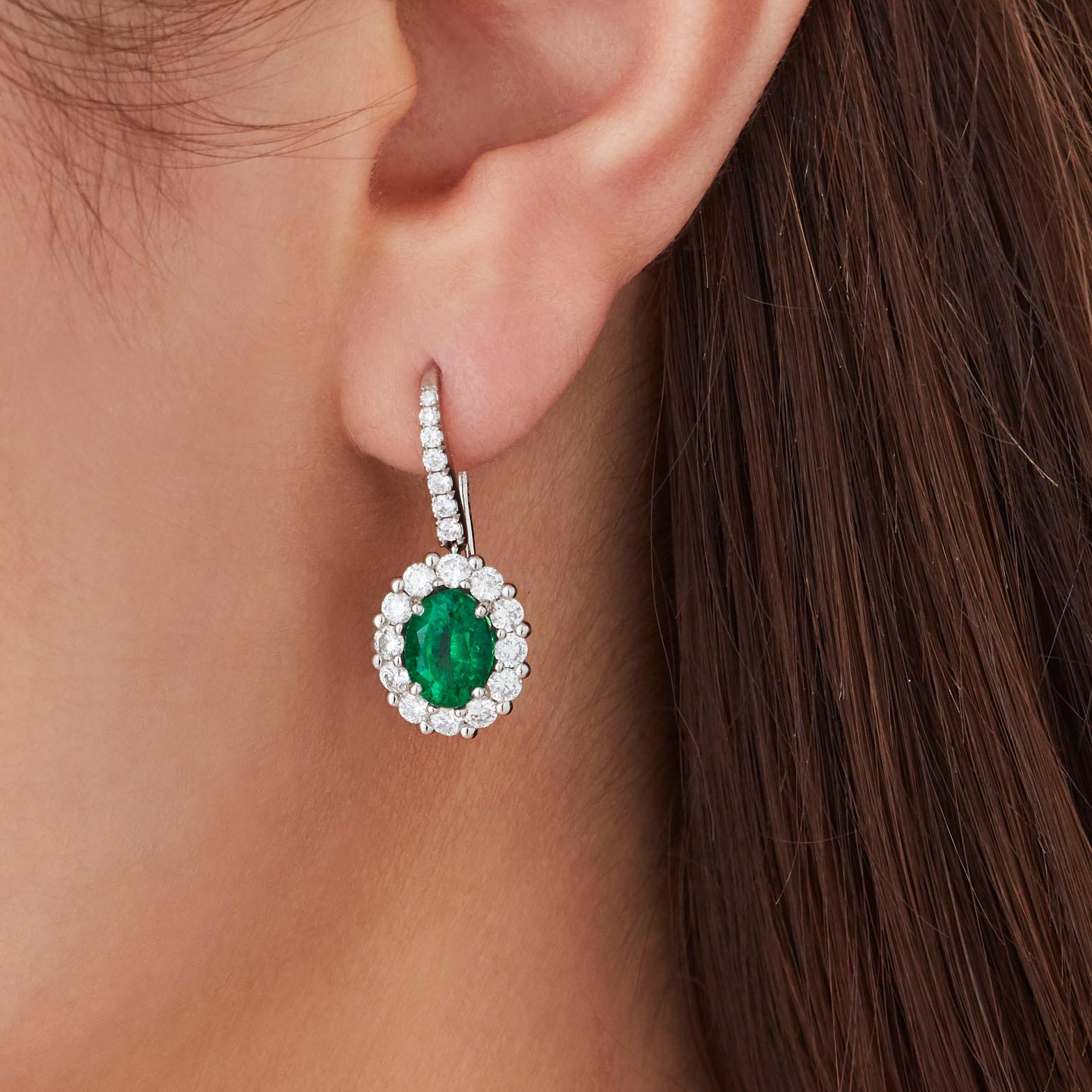 Oval Cut Garrard '1735' Platinum GCS Certified Emerald and White Diamond Cluster Earrings For Sale