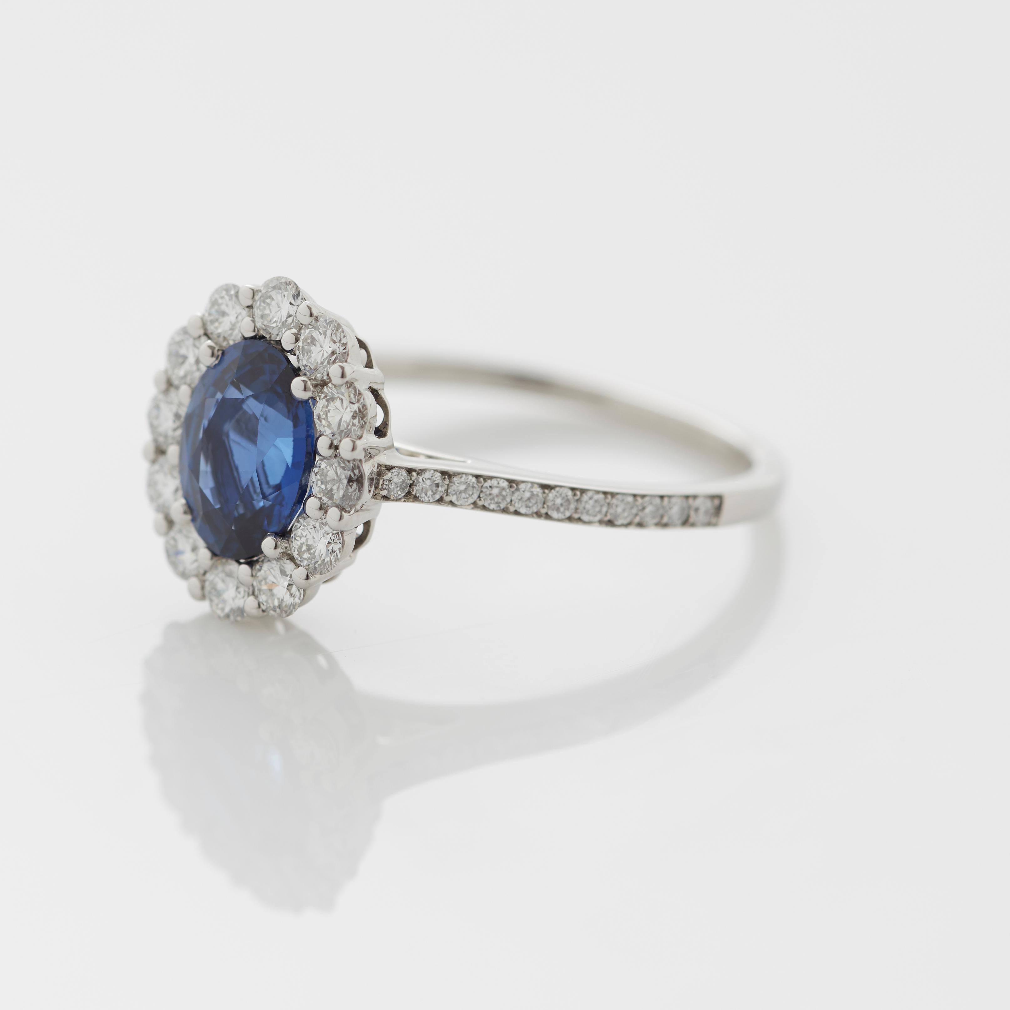 Modern Garrard 1735 Platinum GIA Oval Blue Sapphire Diamond Cluster Engagement Ring For Sale