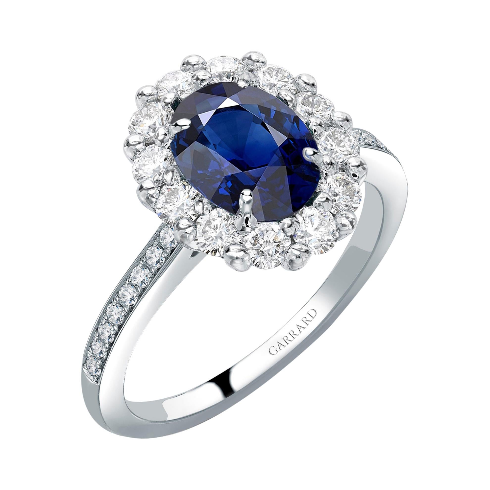 Garrard 1735 Platinum GIA Oval Blue Sapphire Diamond Cluster Engagement Ring For Sale