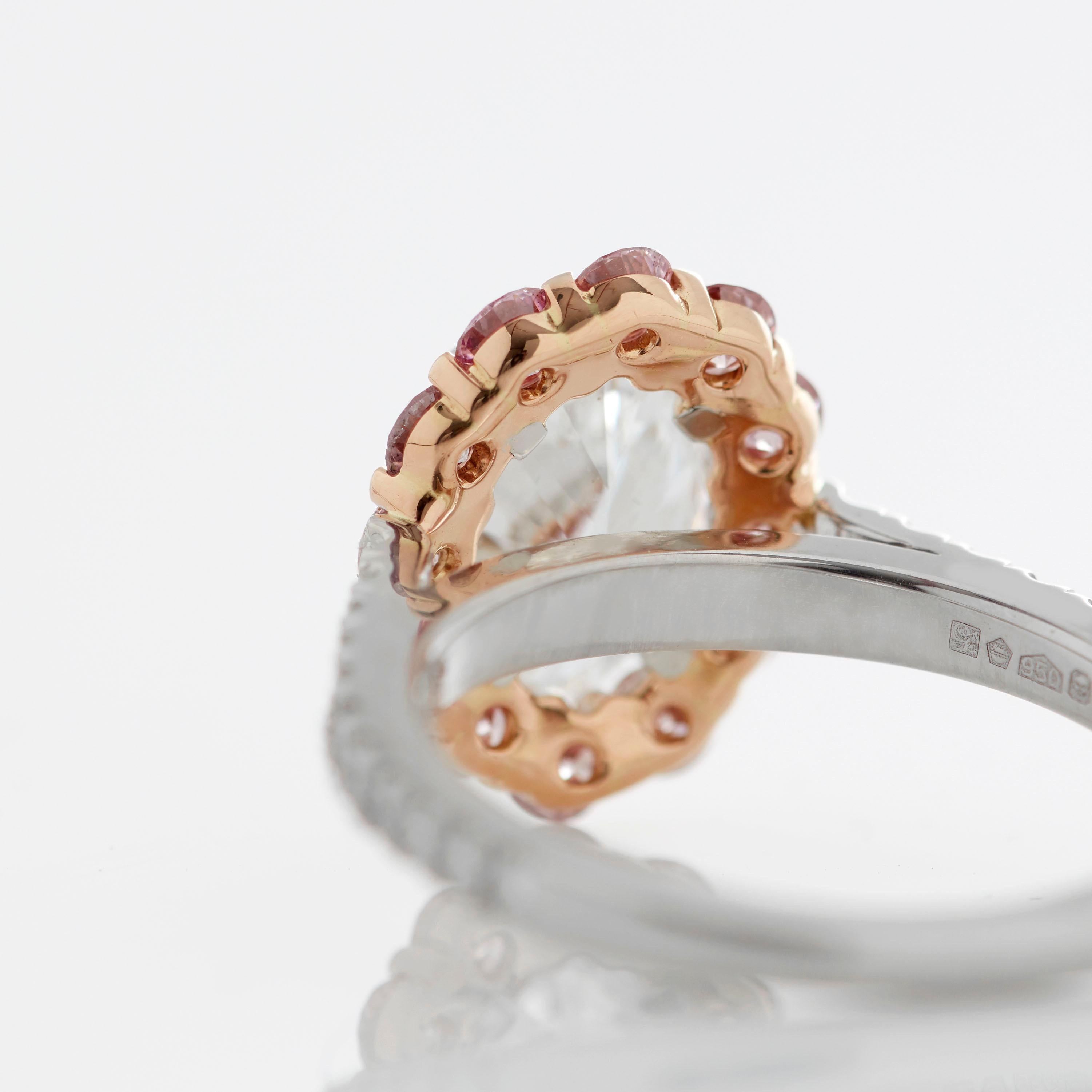 Oval Cut Garrard '1735' Platinum GIA Oval White Diamond with Pink Diamond Surround Ring
