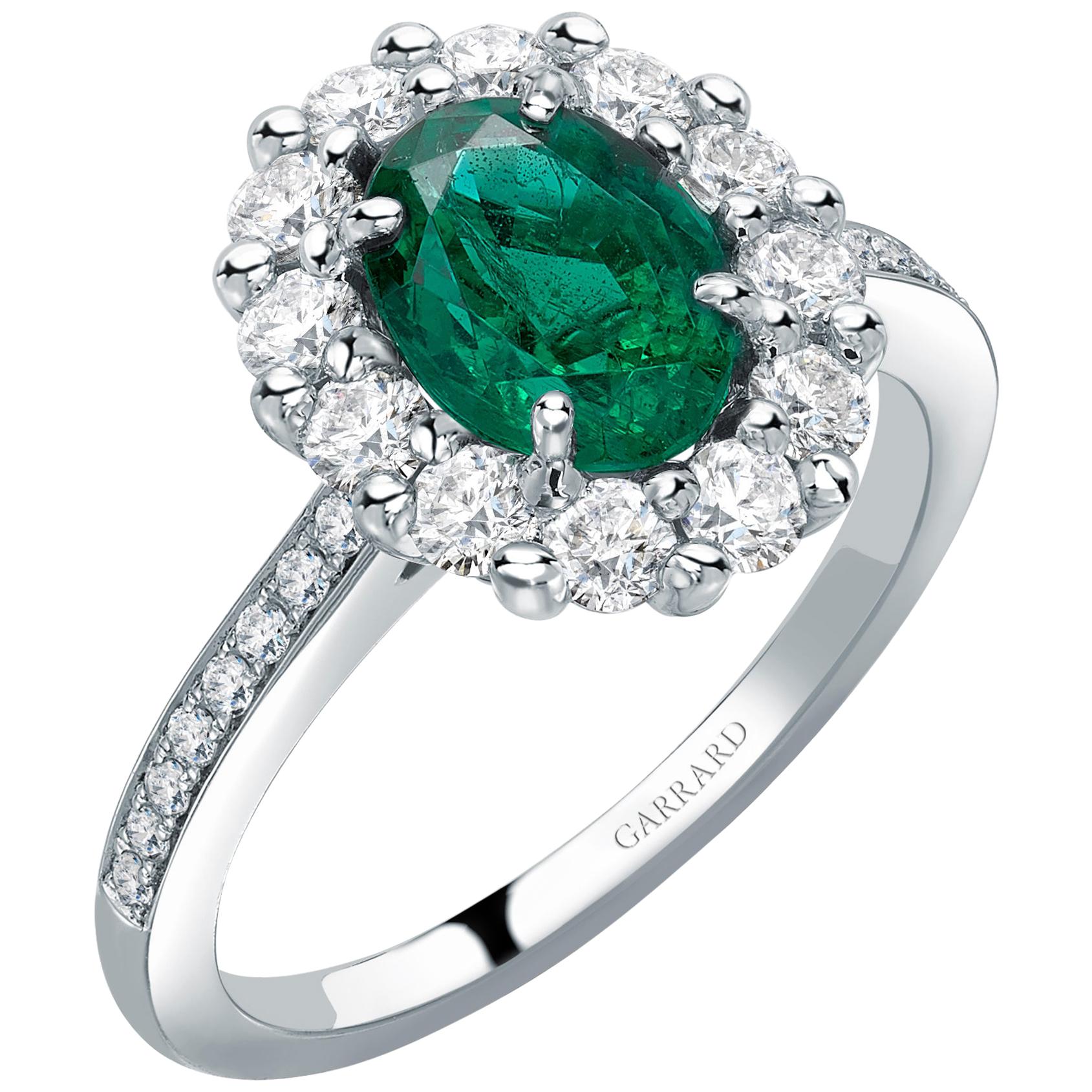 Garrard '1735' Platinum Oval Emerald and White Diamond Cluster Ring