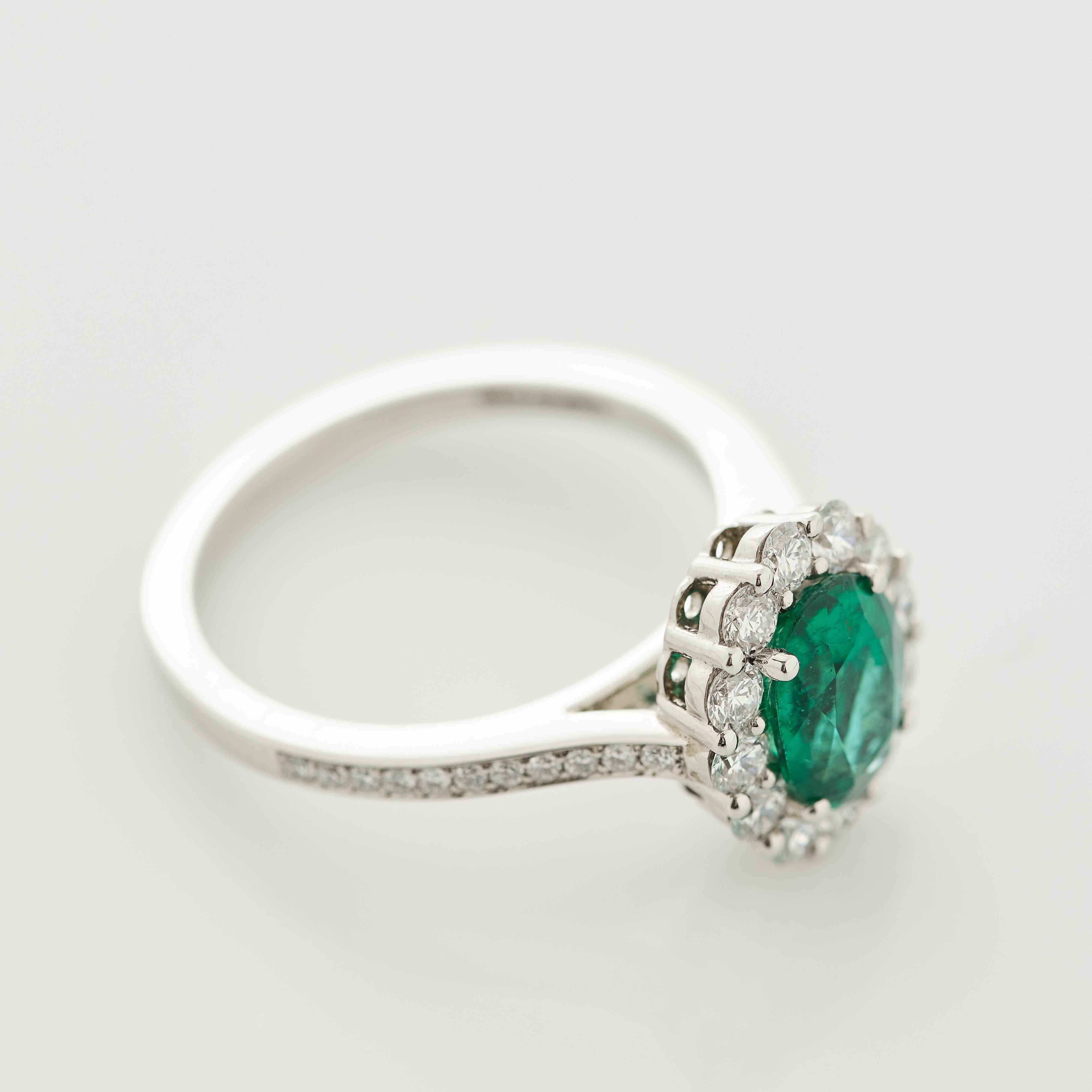Modern Garrard '1735' Platinum Oval Emerald and White Diamond Cluster Ring