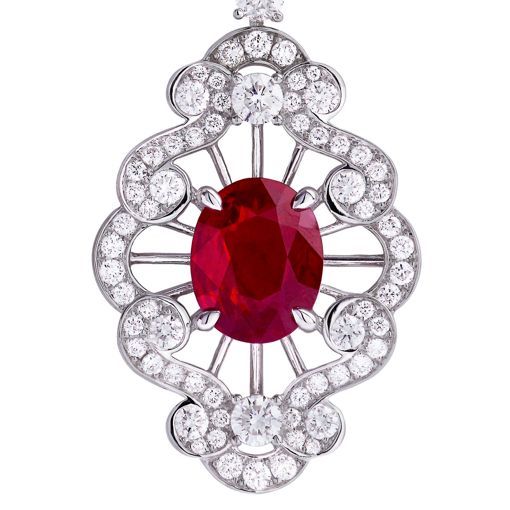 A pair of 18 karat white gold earrings from the House of Garrard Jewelled Vault collection, each set with a central GRS certified oval ruby; 2.96 carat and 3.02 carat and 152 round white diamonds weighing 2.16 carats. The earrings measure 4.8cm in