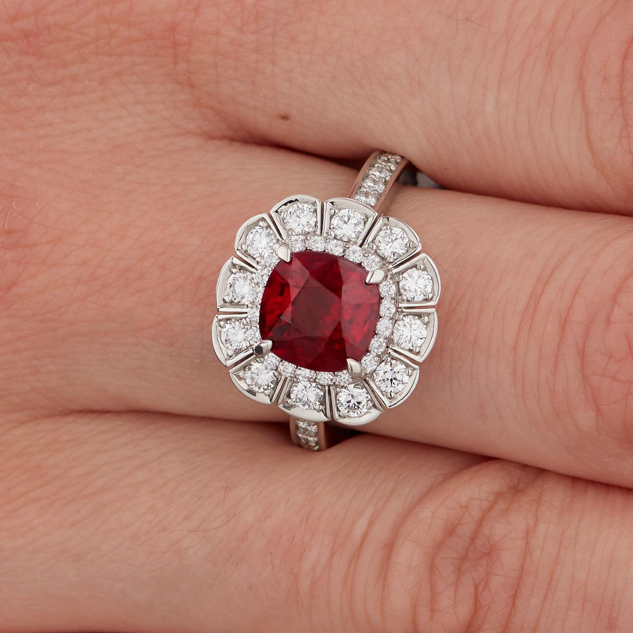 A House of Garrard white gold ring from the Jewelled Vault collection, set with a central GRS certified cushion 3.04 carat vivid red ruby and 48 round white diamonds weighing 2.15 carats. 
Ring size 54 is accompanied by GRS certificate and House of