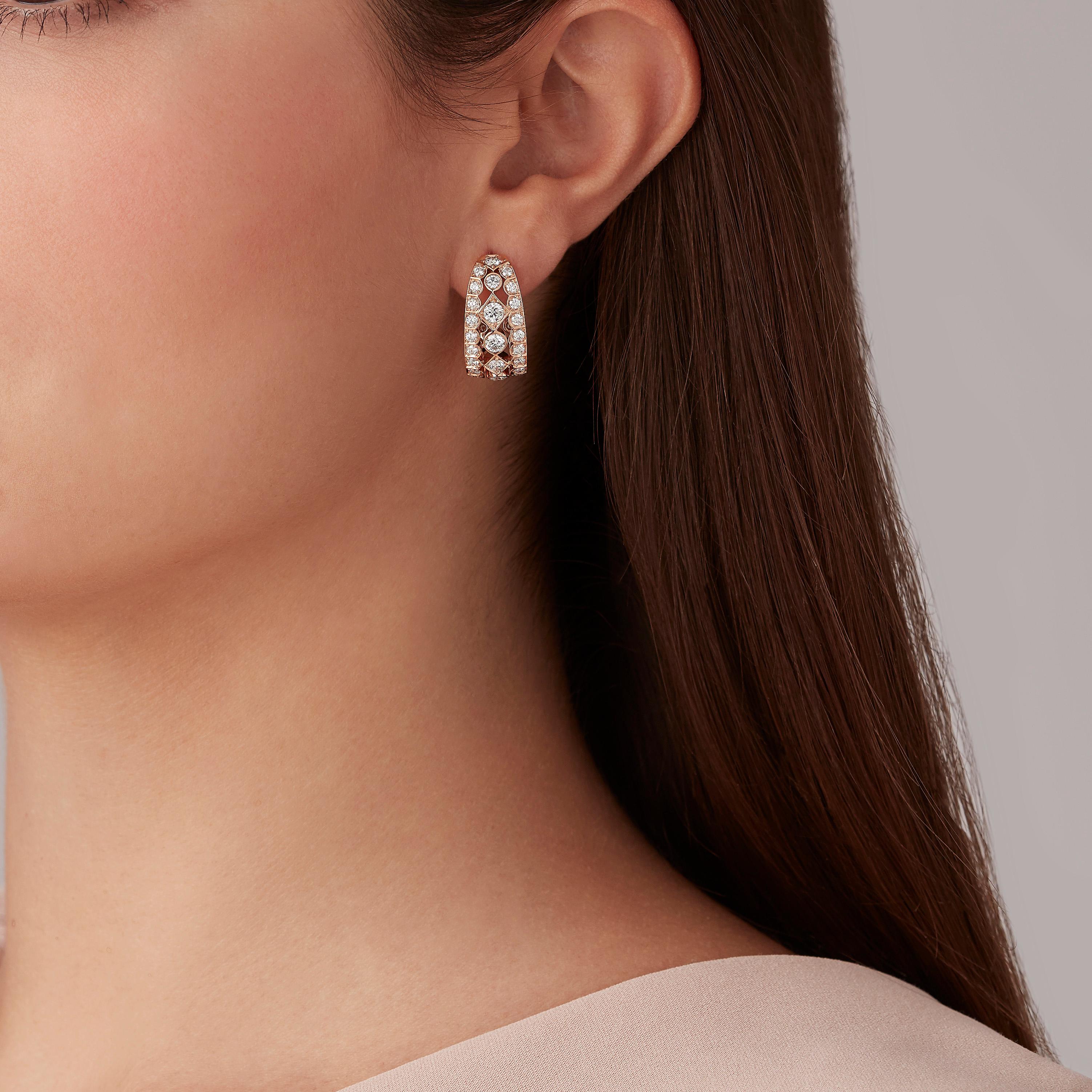 A House of Garrard pair of 18 karat rose gold earrings from the 'Albemarle' collection, set with round white diamonds in the iconic 'diamonds and dots' motif. 

70 round white diamonds weighing: 2.86cts

The House of Garrard is the longest serving