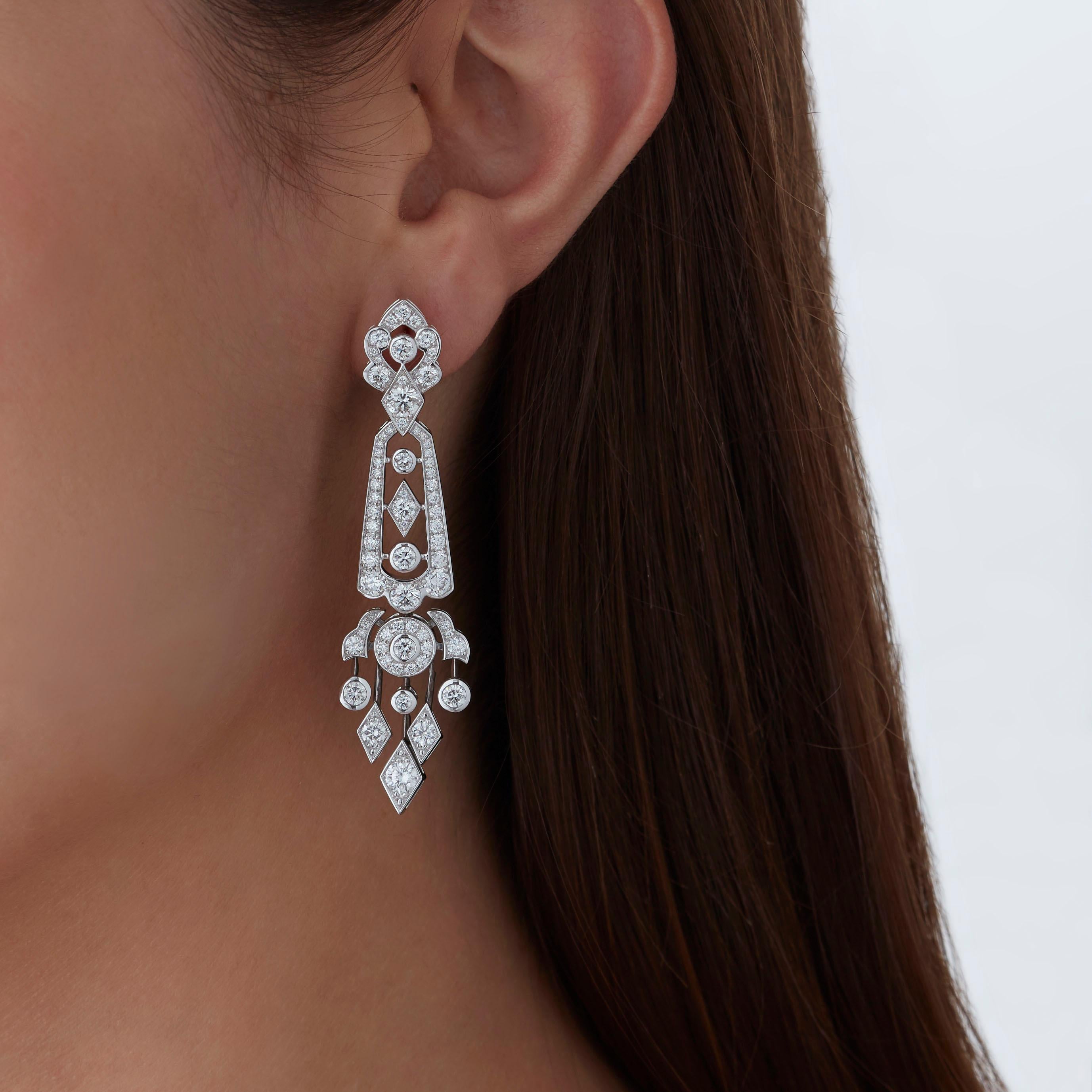 A House of Garrard pair of 18 karat white gold drop earrings from the 'Albemarle' collection, set with round white diamonds.

140 round white diamonds weighing: 4.43cts

The House of Garrard is the longest serving jeweller in the world. The creative