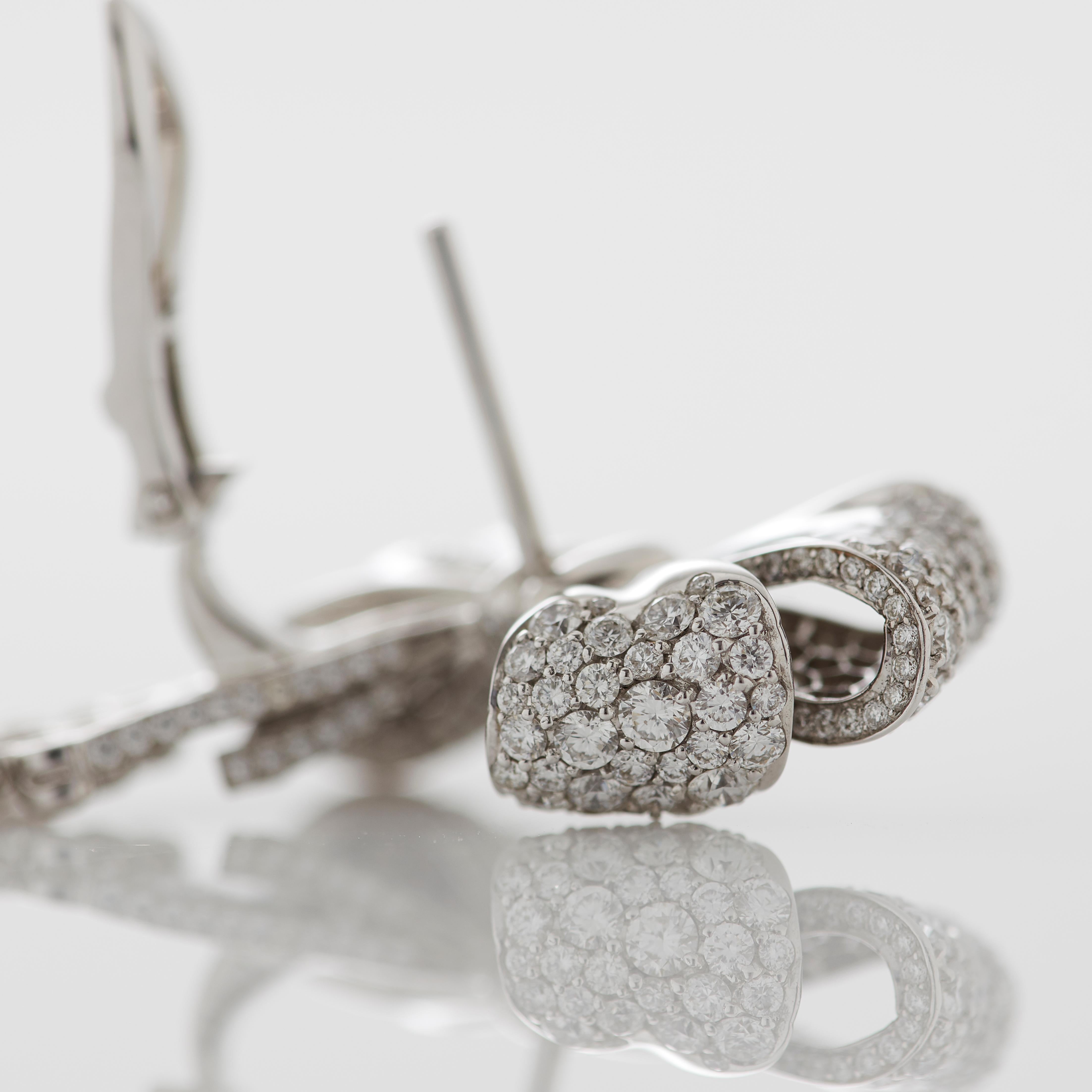 Garrard 'Bow' 18 Karat White Gold Round and Emerald Cut White Diamond Earrings For Sale 3
