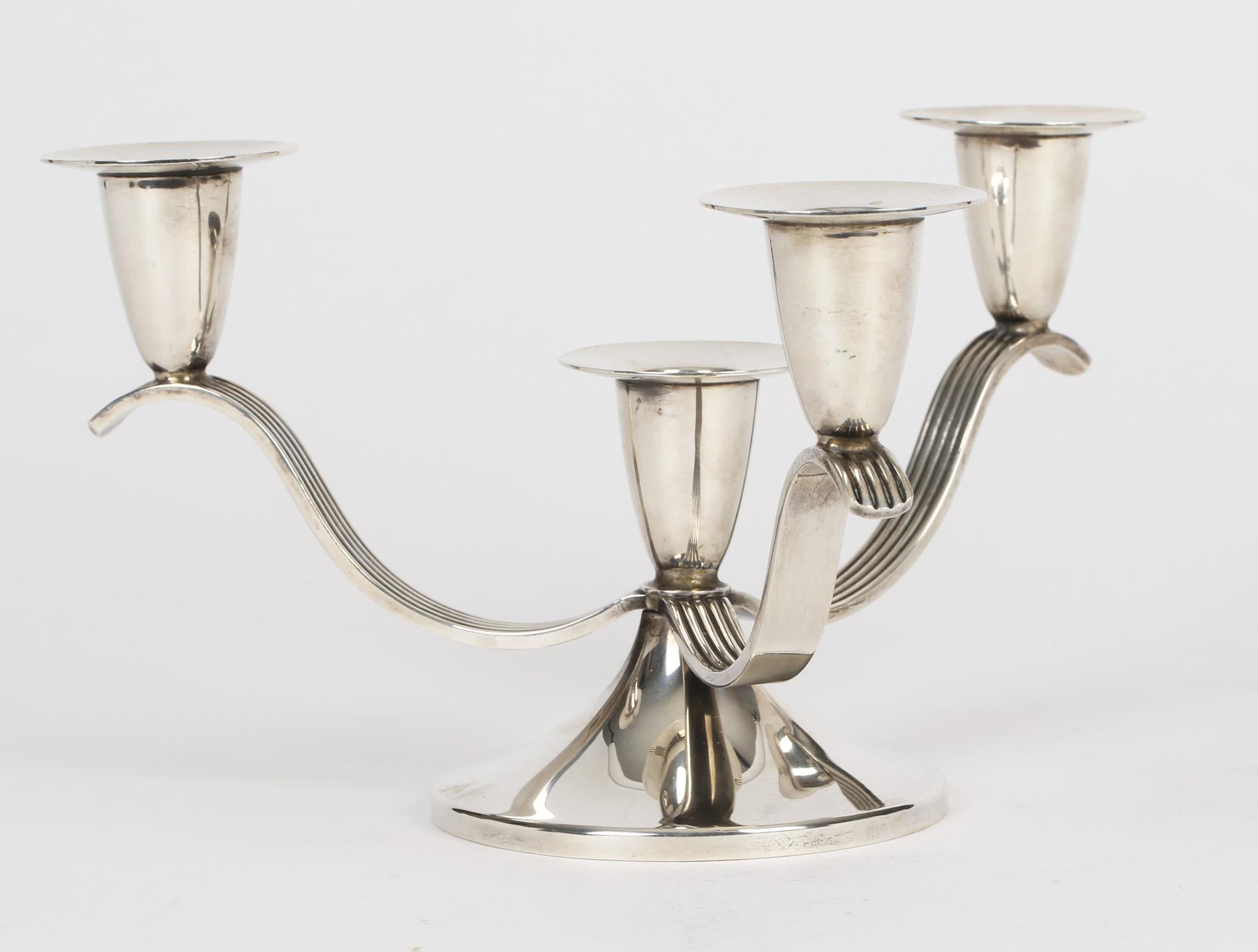 A very fine quality silver three branch candelabra with four candle sconces by Garrard & Co of Regent Street, London and dated 1978. Often referred to as the 'Crown Jewellers' Garrard are renowned for the quality of their craftsmanship. This well