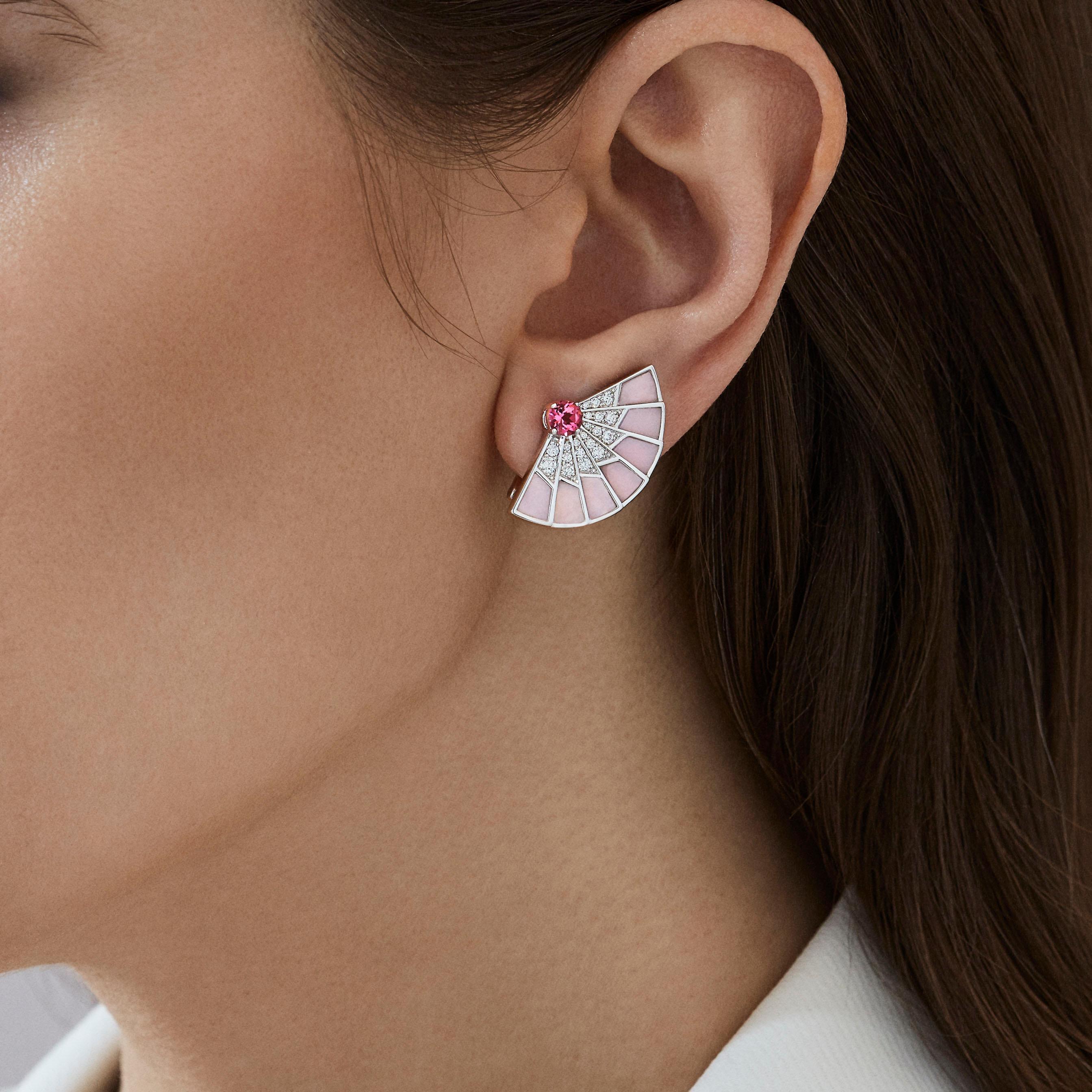 A pair of House of Garrard 18 karat white gold 'Fanfare Symphony' earrings, set with round pink tourmalines, round white diamonds and pink opal inlay.

2 round pink tourmalines weighing: 0.60cts
40 round white diamonds weighing: 0.45cts
14 pieces of