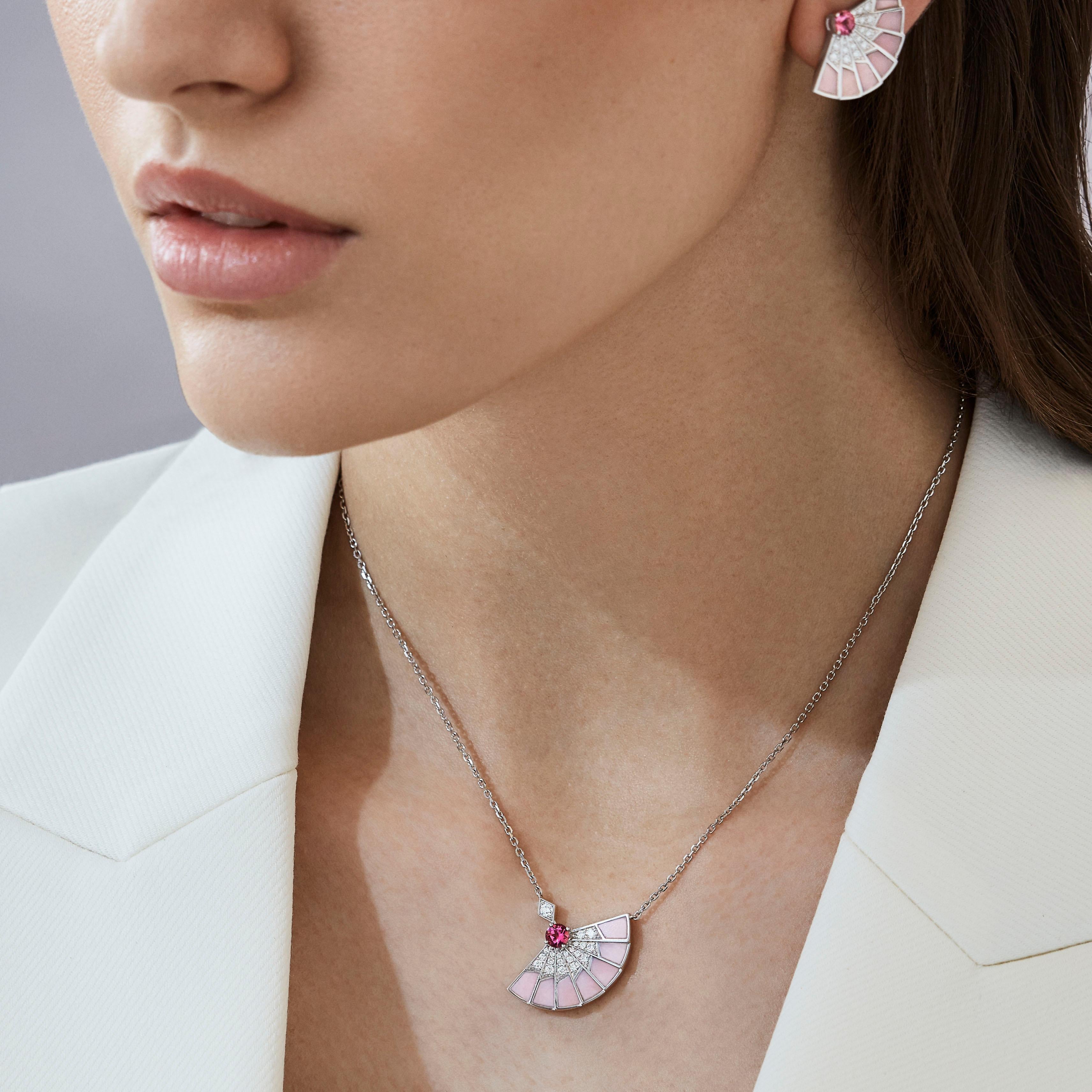 A House of Garrard 18 karat white gold 'Fanfare Symphony' earrings, set with round pink tourmalines, round white diamonds and pink opal inlay.

13 round pink tourmalines weighing: 0.77cts
74 round white diamonds weighing: 0.90cts
19 pieces of pink