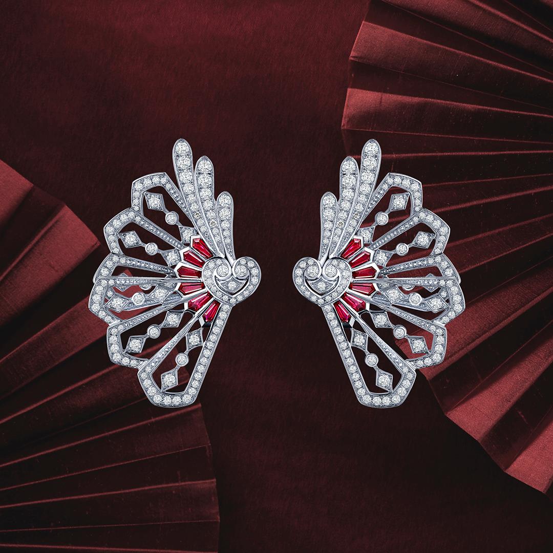 Garrard 'Fanfare' White Gold White Diamond and Calibre Cut Ruby Ear Climbers  In New Condition For Sale In London, London