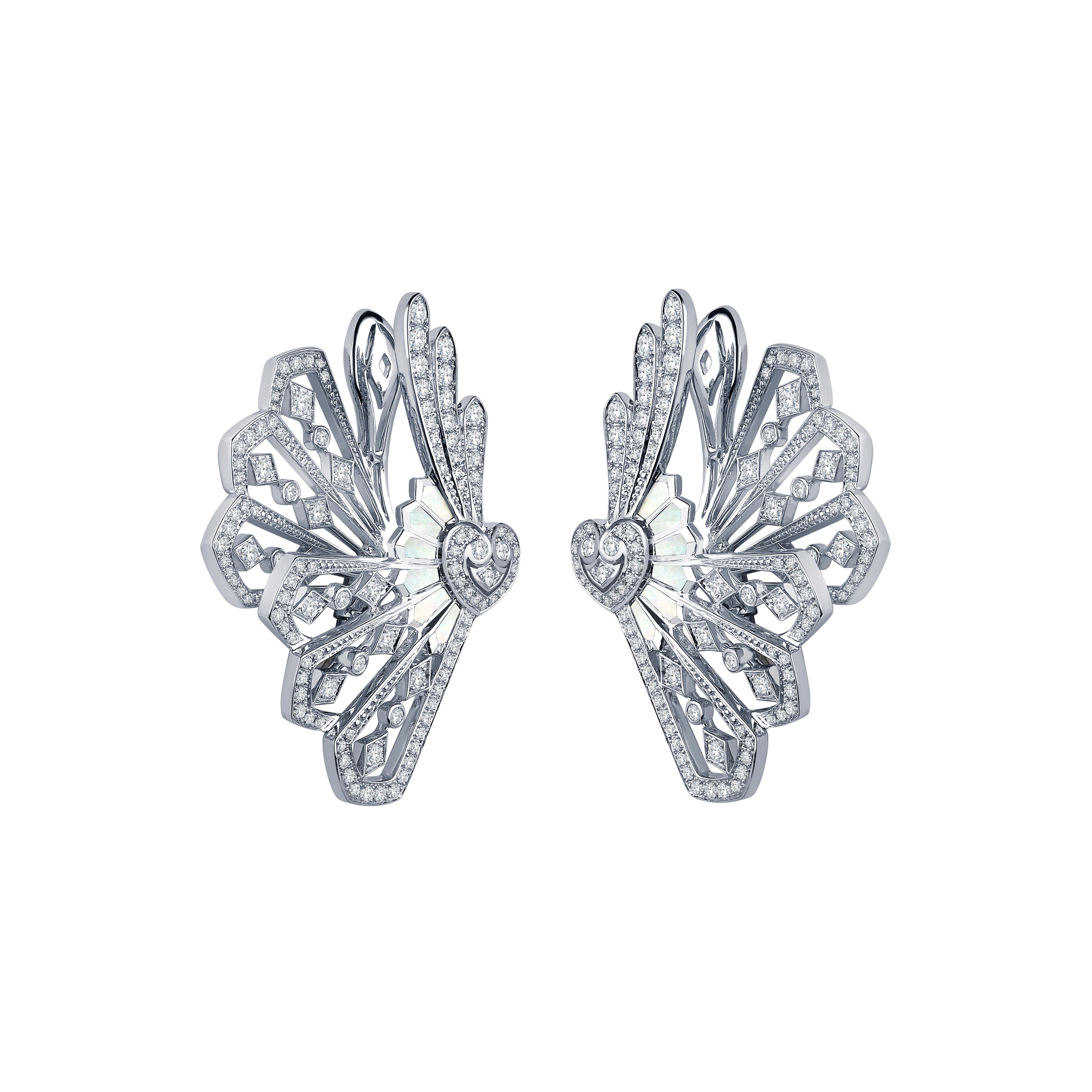 A pair of House of Garrard 18 karat white gold  ear climbers from the 'Fanfare' collection, set with round white diamonds and calibre cut white mother of pearl.

236 round white diamonds weighing: 1.80 carats
12 calibre cut white mother of pearl