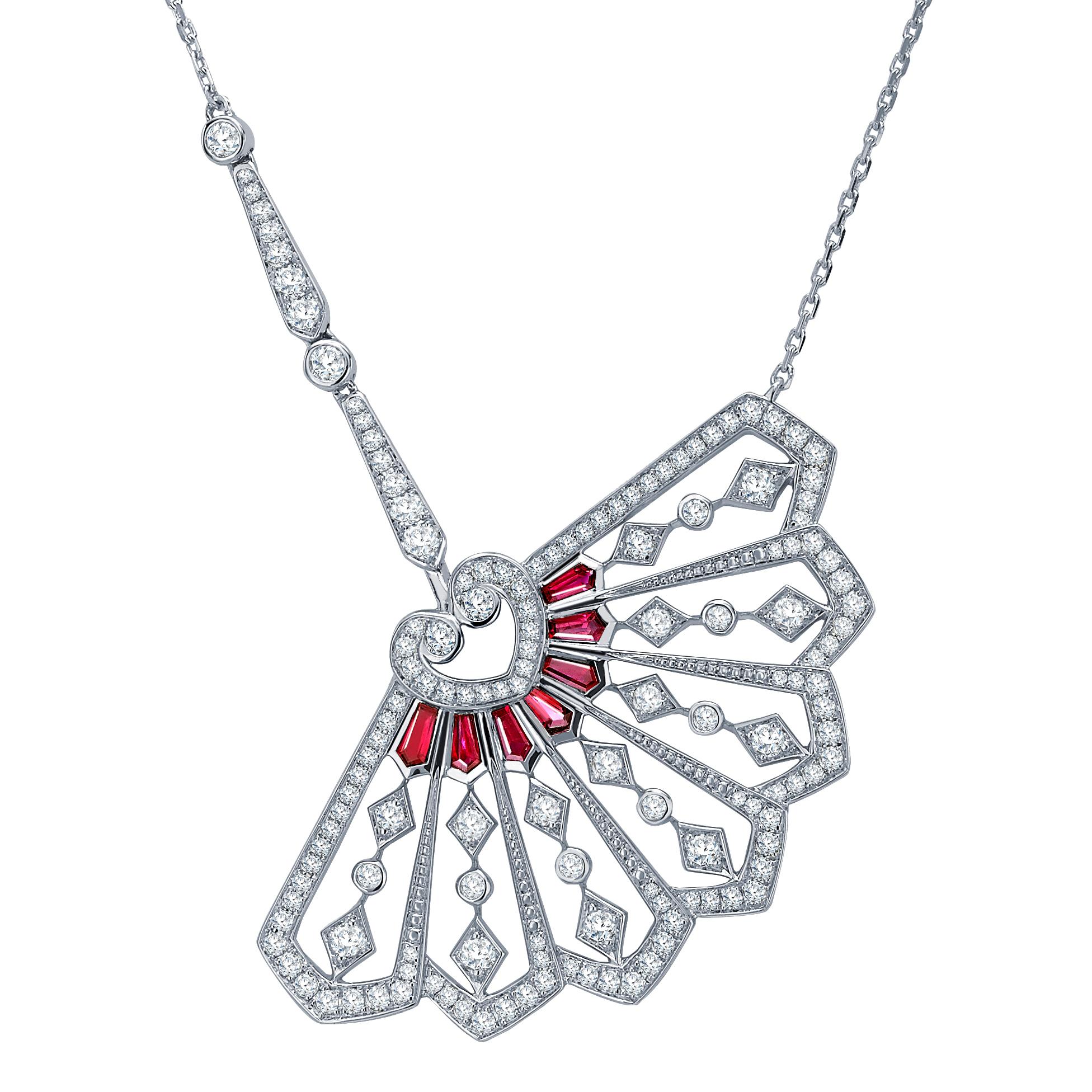 A House of Garrard 18 karat white gold pendant from the 'Fanfare' collection, set with round white diamonds and calibre cut rubies. The total length of the pendant is 42cm. 

143 round white diamonds weighing 1.29 carats
7 calibre cut rubies