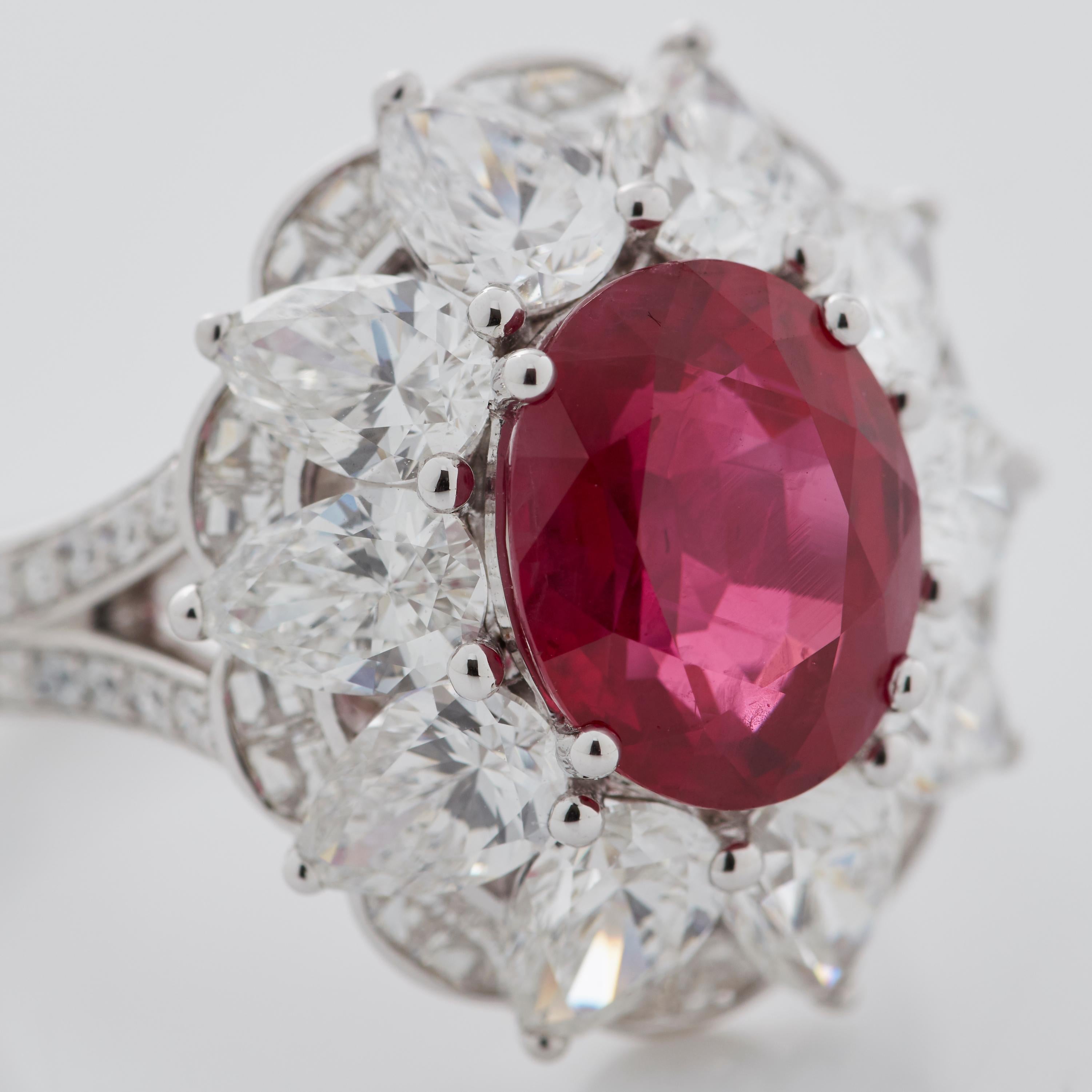 Garrard 18 Karat White Gold GRS 5.05cts Oval Ruby & White Diamond Cluster Ring In New Condition For Sale In London, London