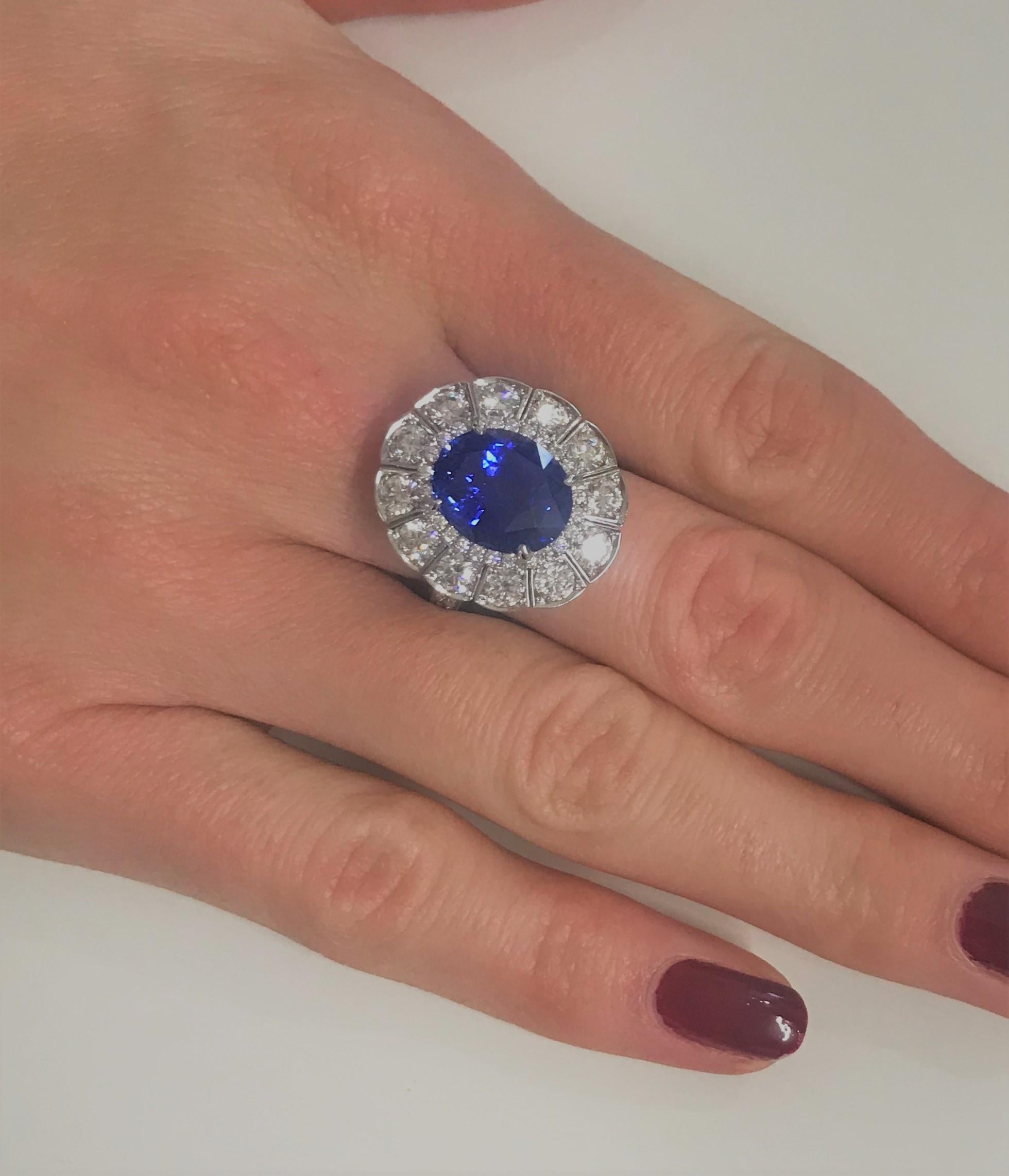 A House of Garrard platinum ring from the Jewelled Vault collection, set with a central GRS certified oval 6.01 carat sapphire and 48 round white diamonds weighing 2.15 carats. 
1 oval sapphire weighing 6.01 carat GRS certified 'Origin Madagascar,